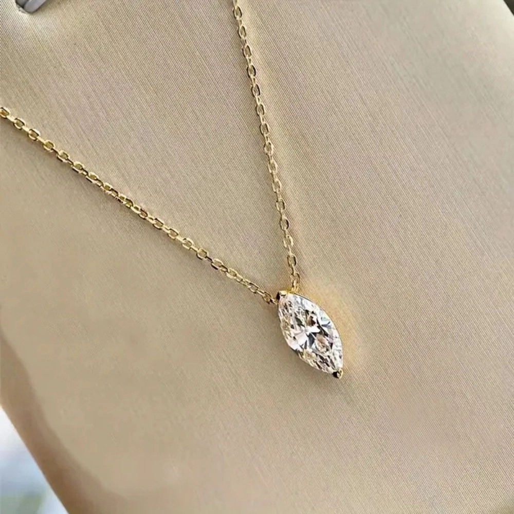 Wardrobe Whimsy Marquise Cut Cubic Zirconia Solitaire Pendant Gold Tone Necklace