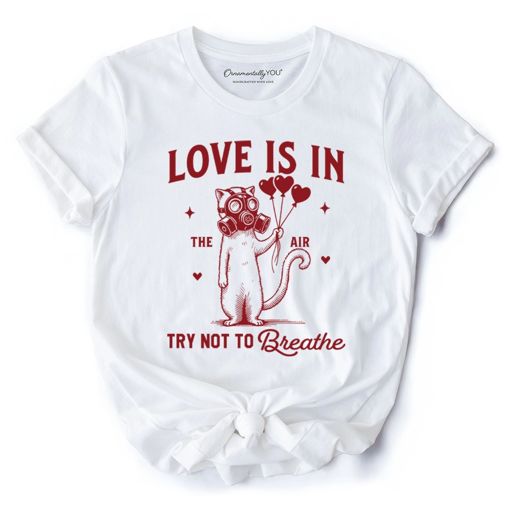 OrnamentallyYou Womens Love Is The Air Try Not To Breathe" Funny Anti-Valentine Cat T-Shirt