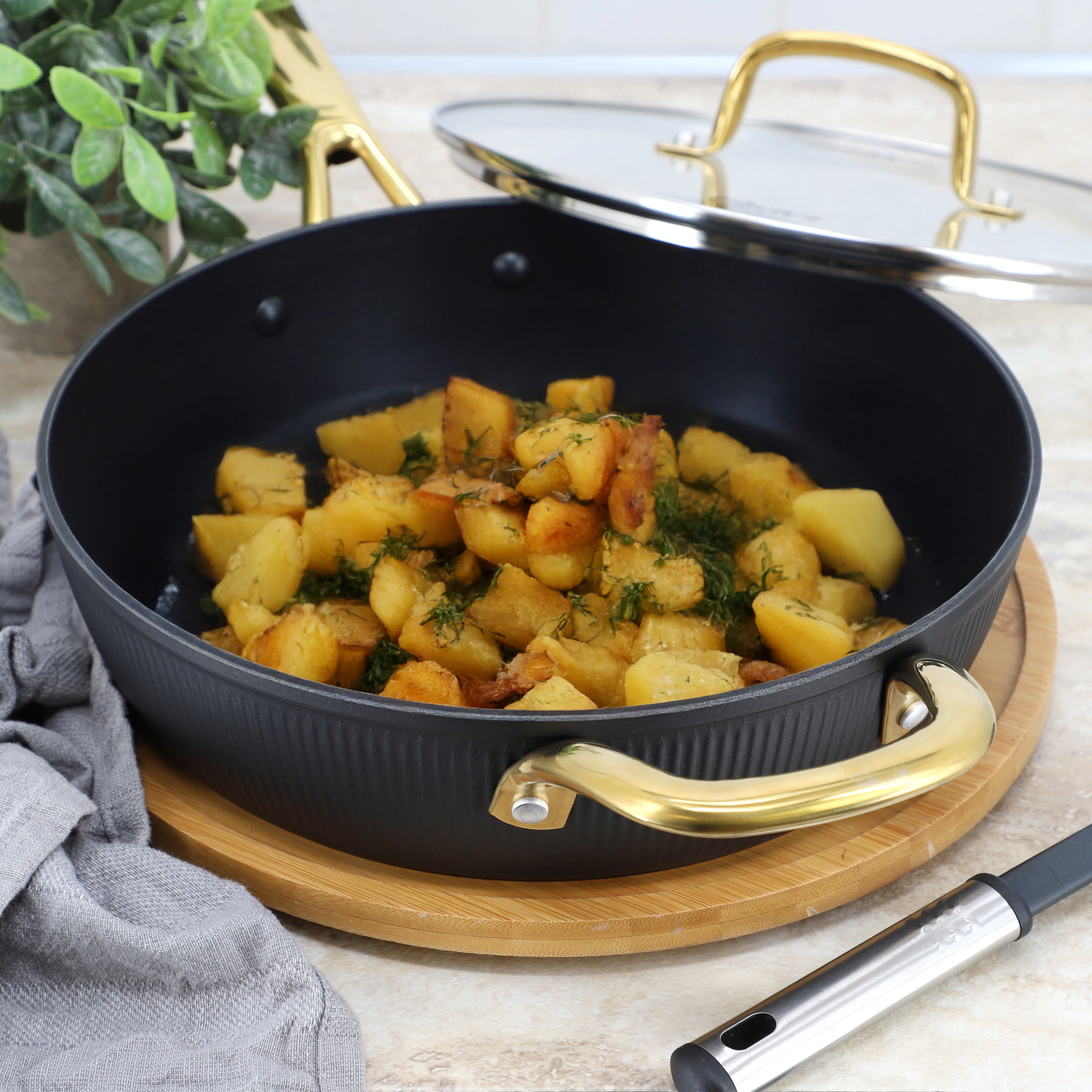 Oster Abbottsford 4 Quart Nonstick Aluminum Saute Pan with Glass Lid in Black