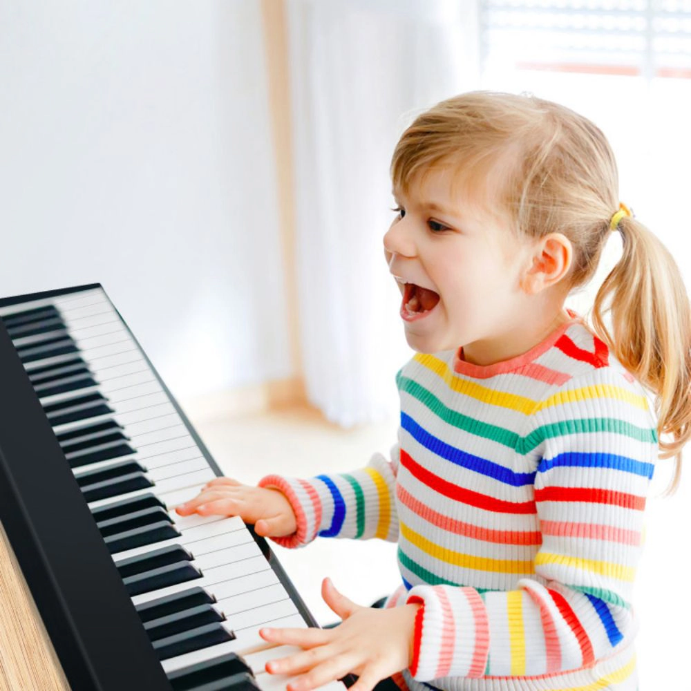 SUGIFT 61-Key Folding Piano Keyboard with Full Size Keys and Music Stand 35.5-in Unfolded 17.5-in Folded Ages 3+ Black