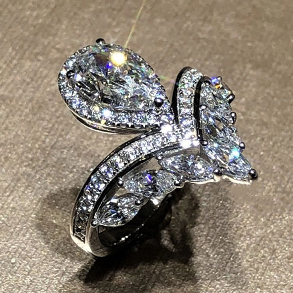 Wardrobe Whimsy Womens Pear Cut Halo Cubic Zirconia Ring Marquise Accent Twisted Cocktail Ring