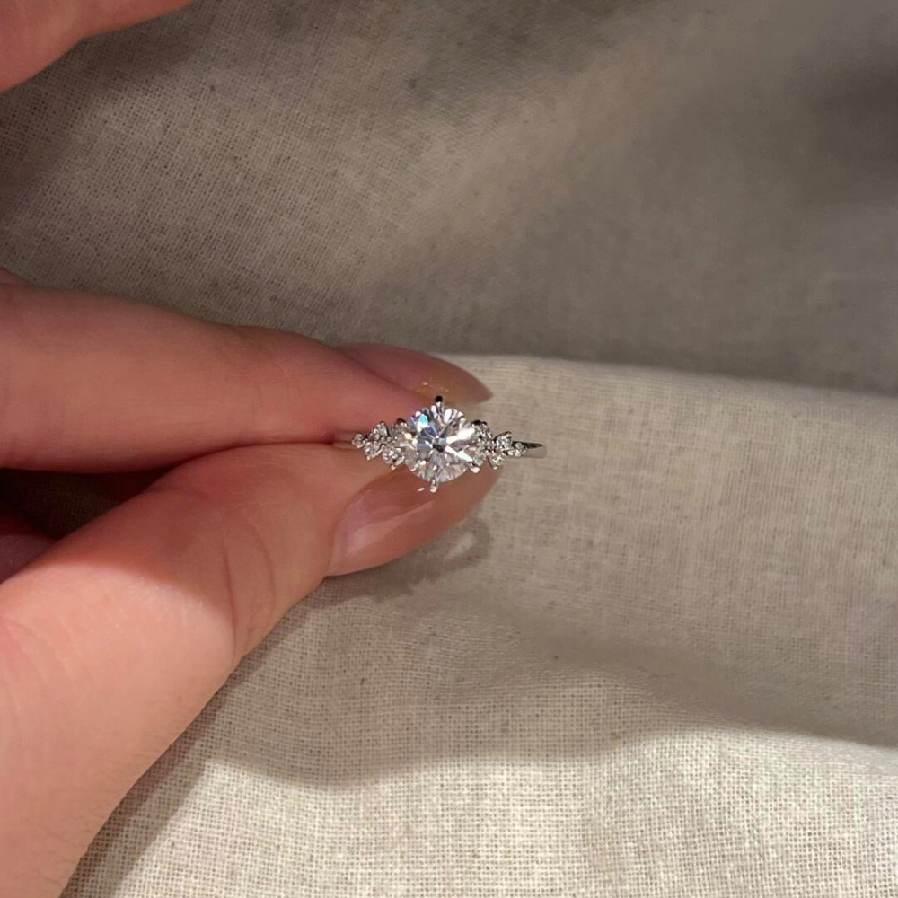 Wardrobe Whimsy Round Cut Cubic Zirconia Side Stone Engagement Ring