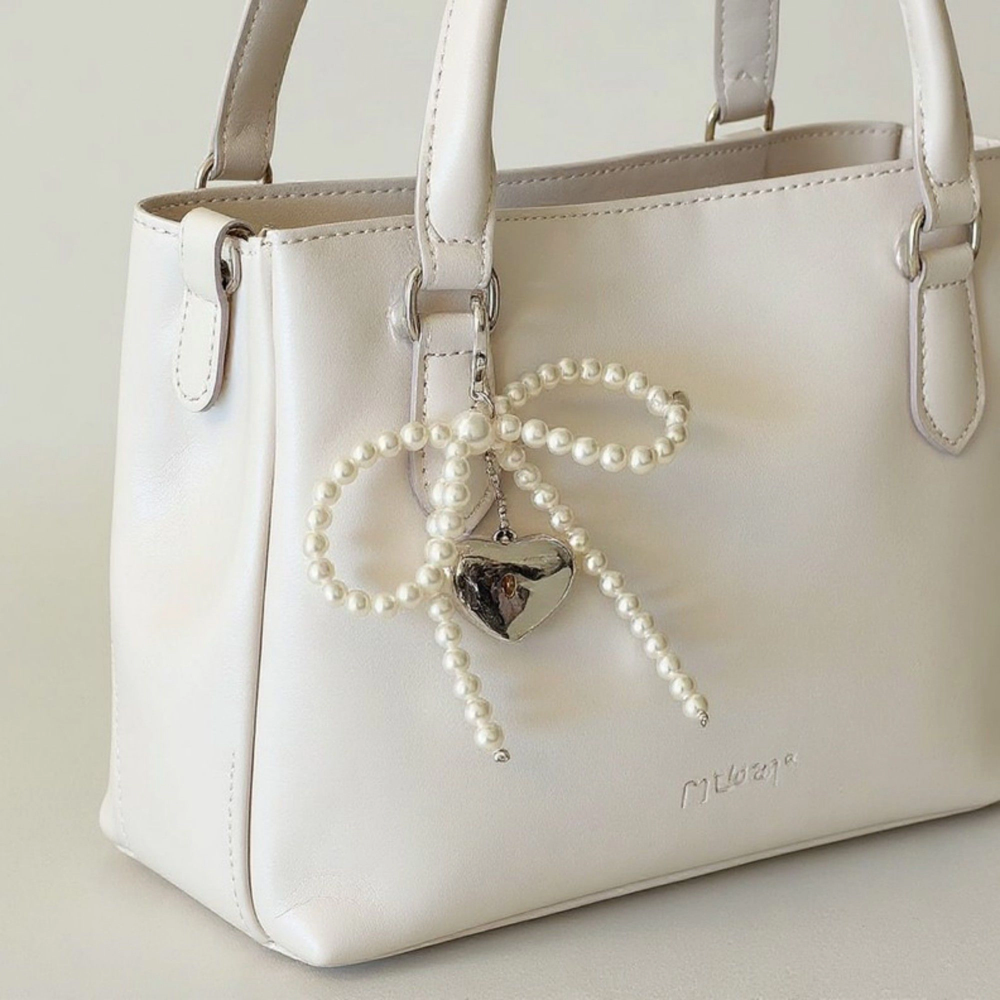 Alilang Women's Pearl Beaded Bow Keychain with Silver Heart Charm and Heart Clip