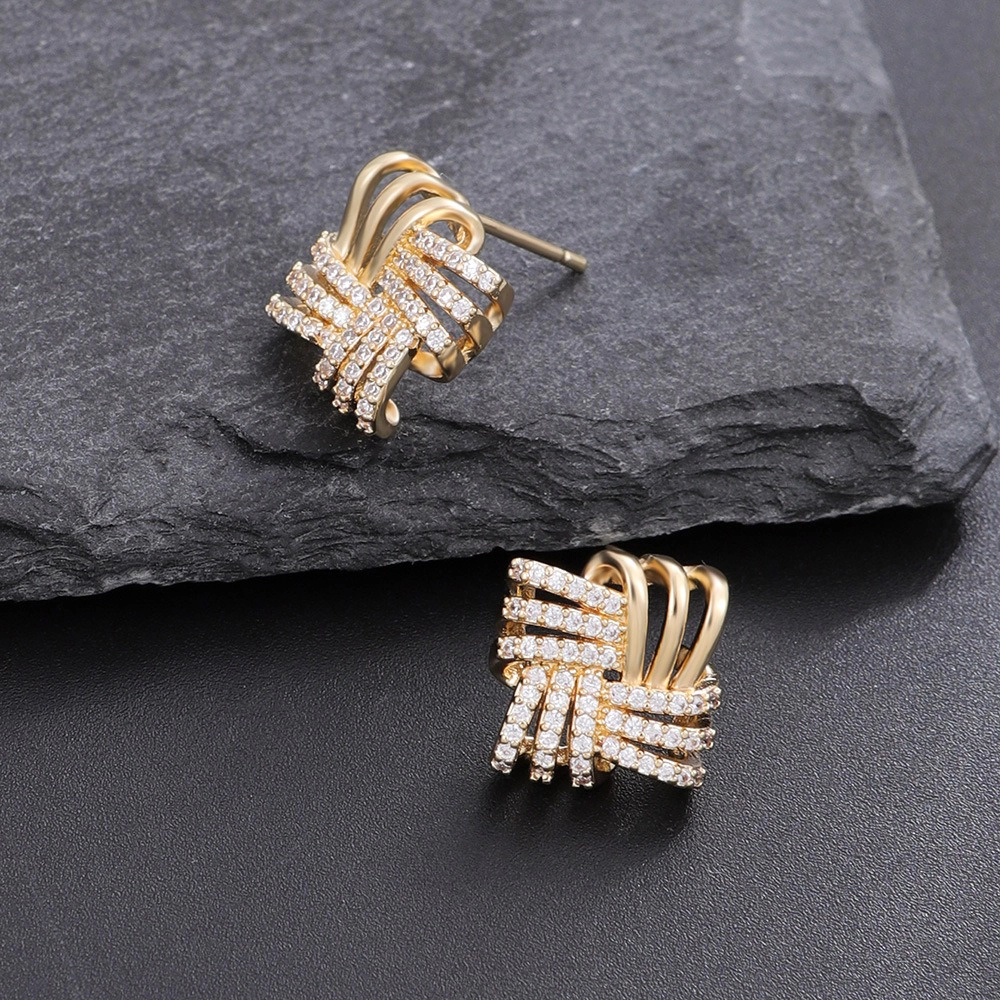 Intertwined Ribbon Pave Cubic Zirconia Huggie Earring