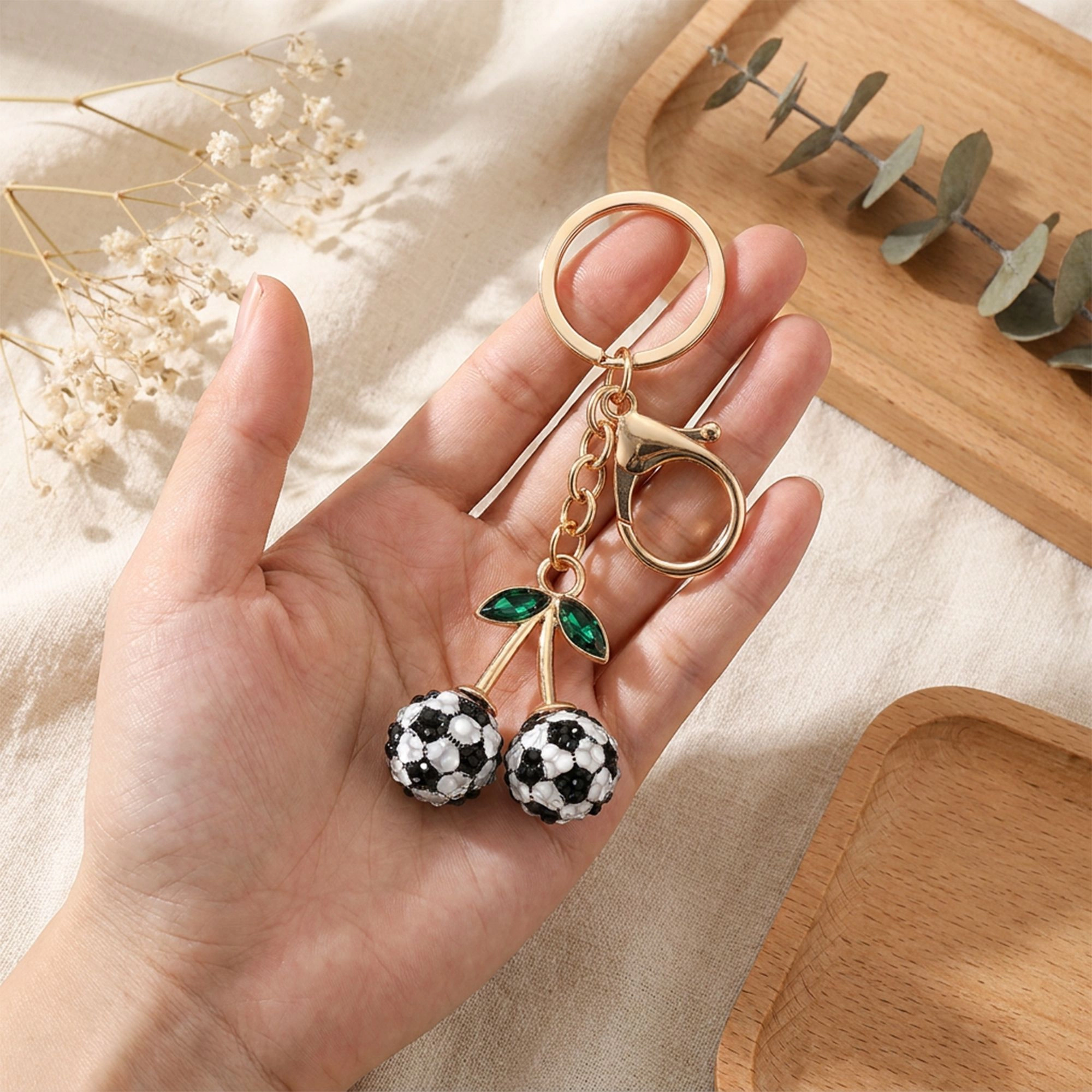 Alilang Women's 2 Pack Sports Ball Cherry Keychains with Gold Tone Clip and Leaf Charm, Black