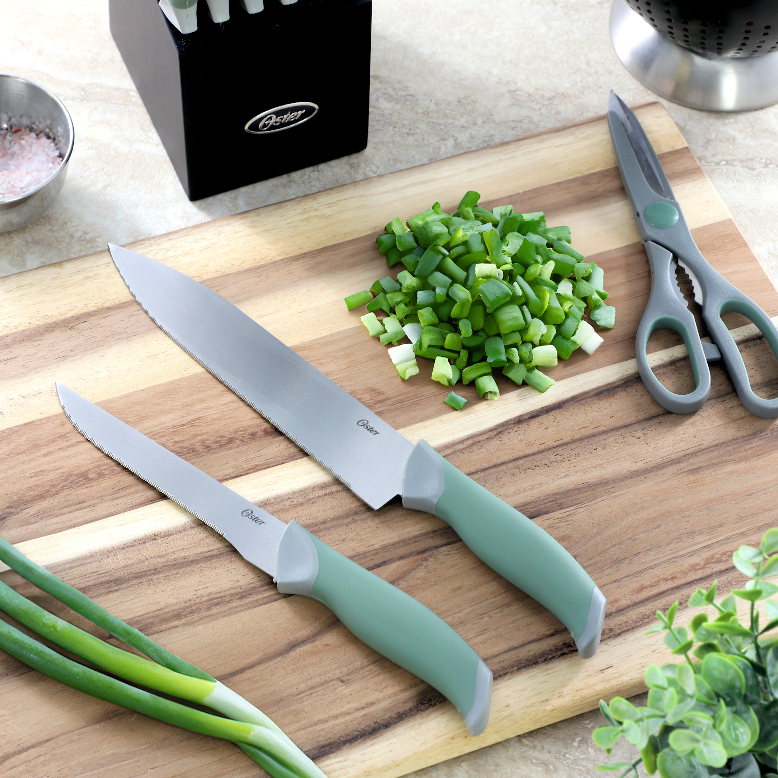 Oster Lindbergh 14 Piece Stainless Steel Cutlery Set in Green with Soft Grip Handles