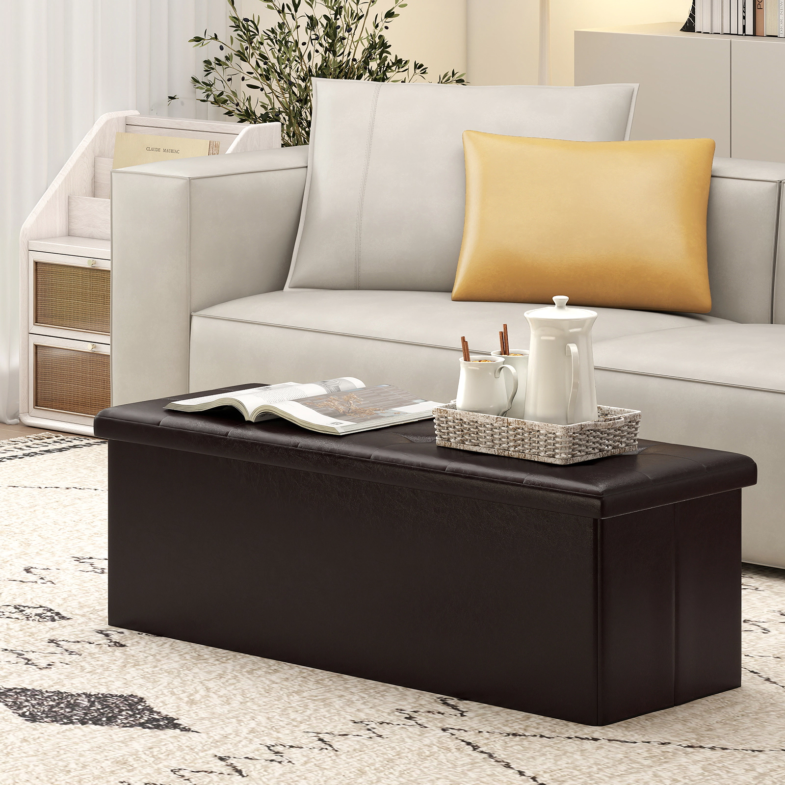 SUGIFT 43-in Folding Storage Ottoman Bench Foot Rest Stool 550-lb Capacity with 38-Gallon Storage Brown PU Leather