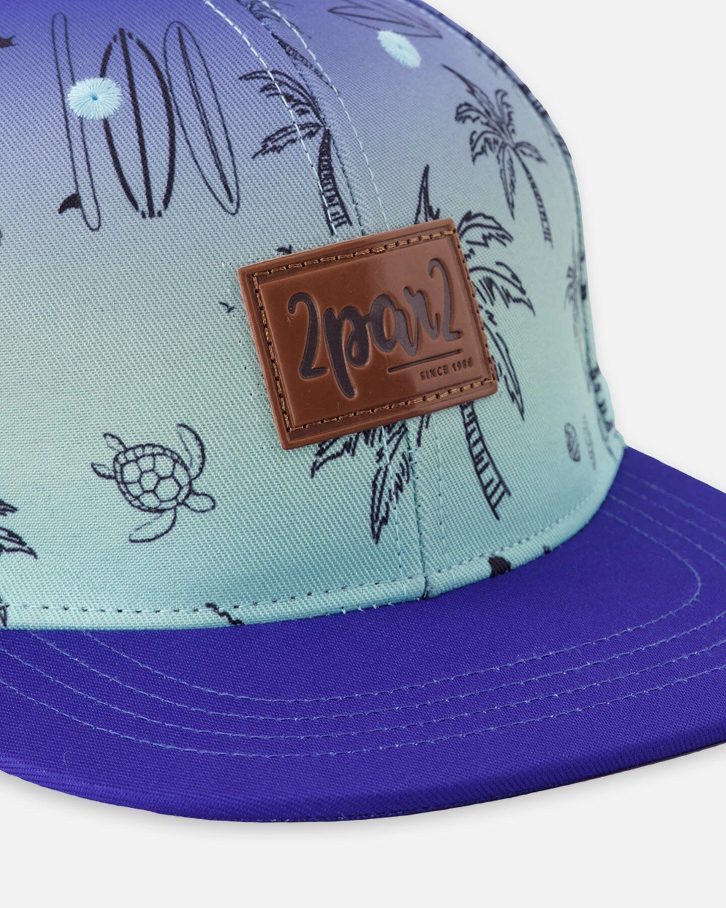Deux par Boys Beach Print Contrast Brim Logo Patch Cap