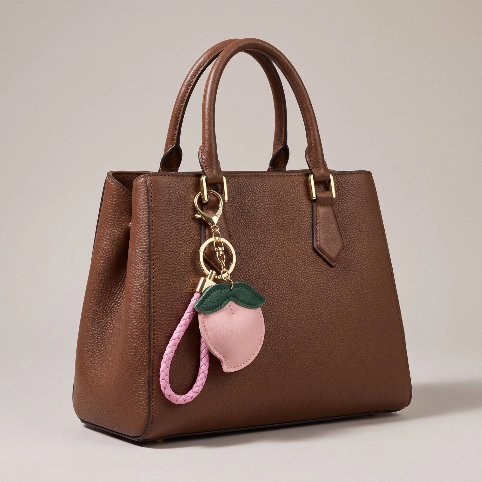 Alilang Women's Peach Bag Charm with Braided Leather Loop and Gold Tone Hardware