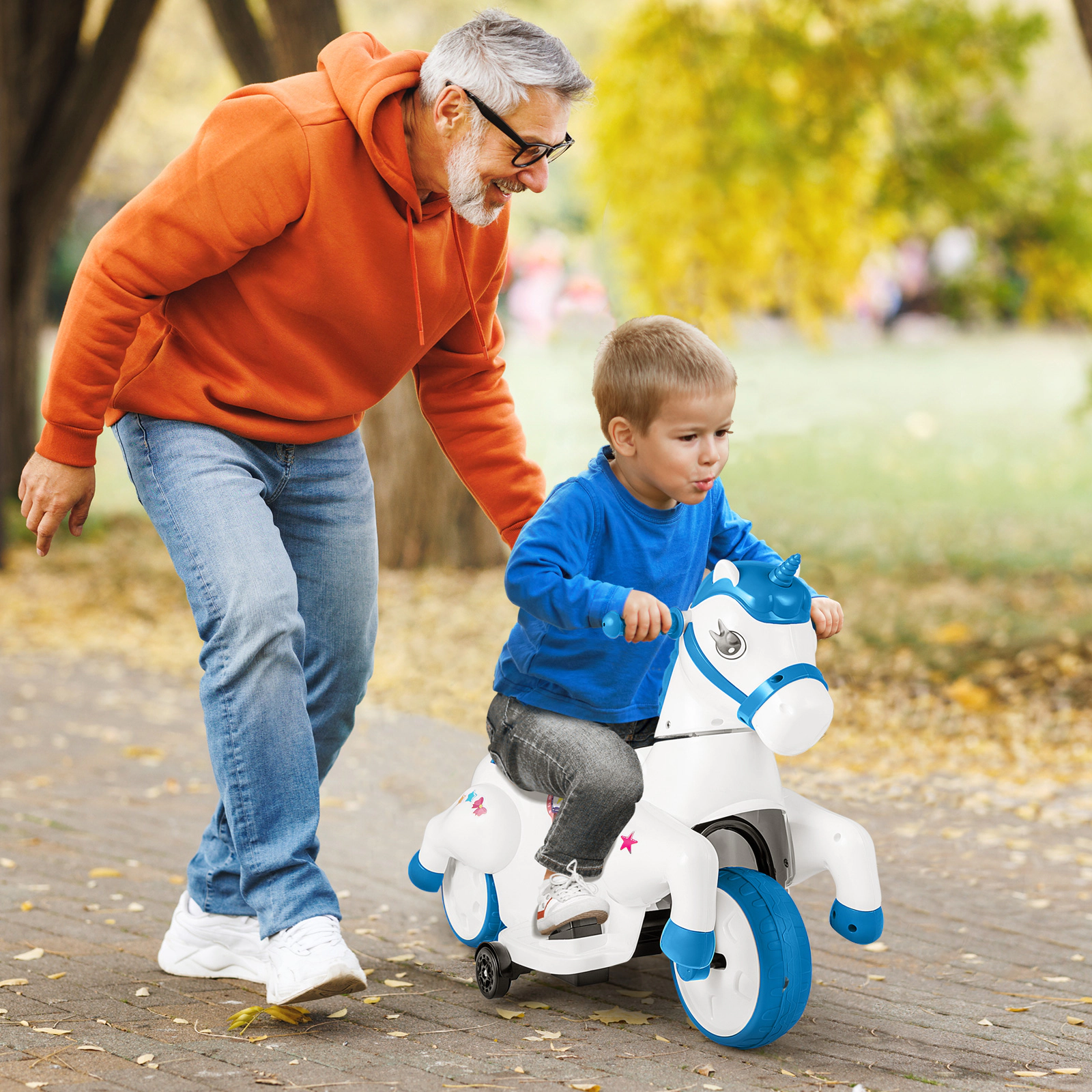 SUGIFT 12V Unicorn Ride-On Toy with Training Wheels and Horse Riding Mode 66-lb Capacity Ages 3+ 27-in Frame Navy