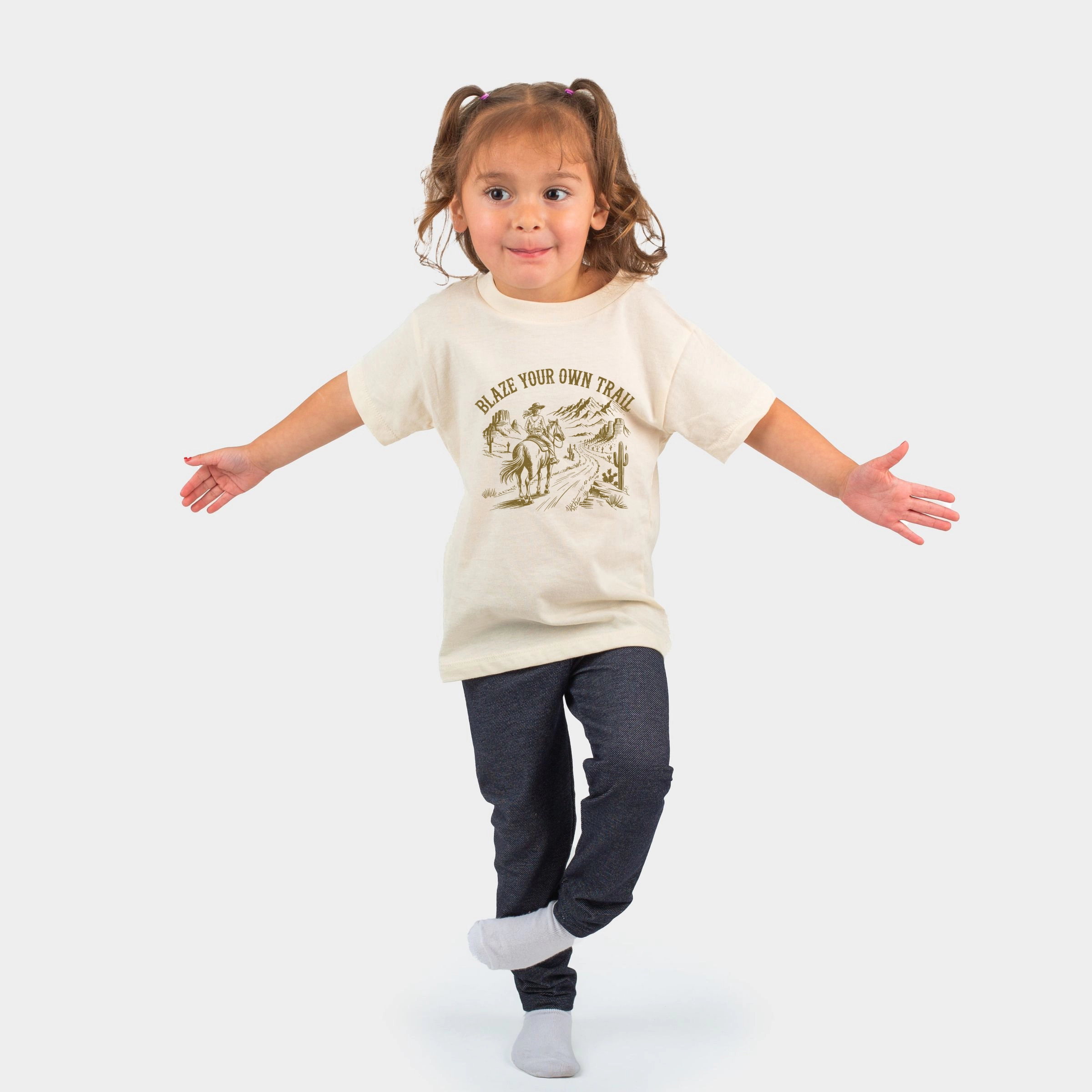 The Juniper Shop - Blaze Your Own Trail Cowgirl Toddler Short Sleeve Graphic T-Shirt