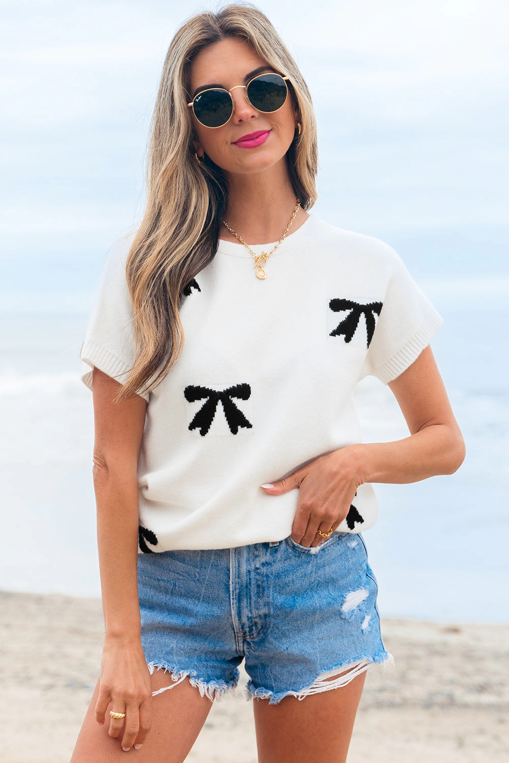 Threaded Pear Women's Kya Bow Pattern Knit Short Sleeve Sweater