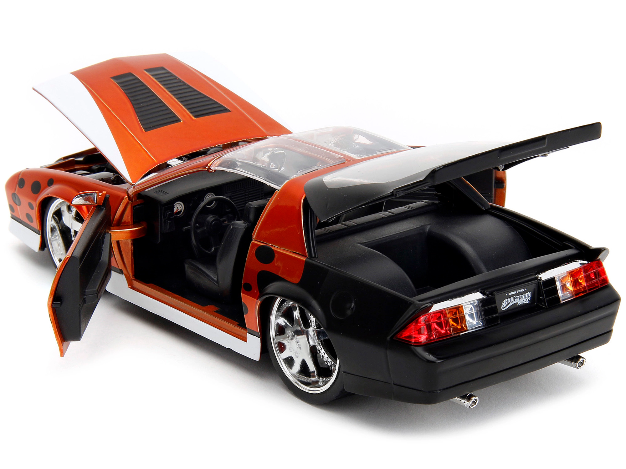Jada 1985 Chevrolet Camaro Z/28 Orange Metallic with Graphics and Chester Cheetah Diecast Figure "Cheetos"