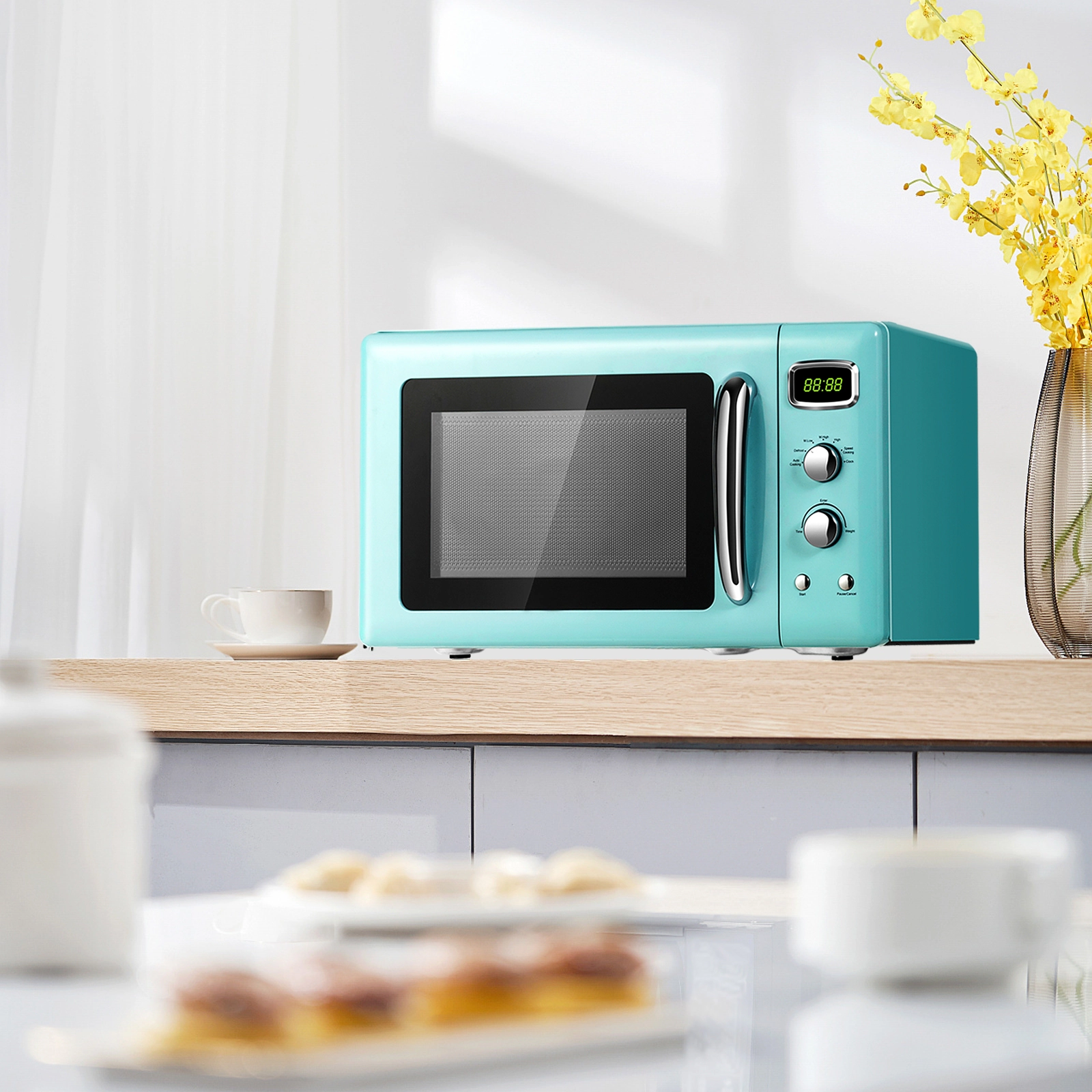 SUGIFT Green 0.9-cu ft 900W Retro Countertop Microwave Oven with Power Selector Knob and Child Lock