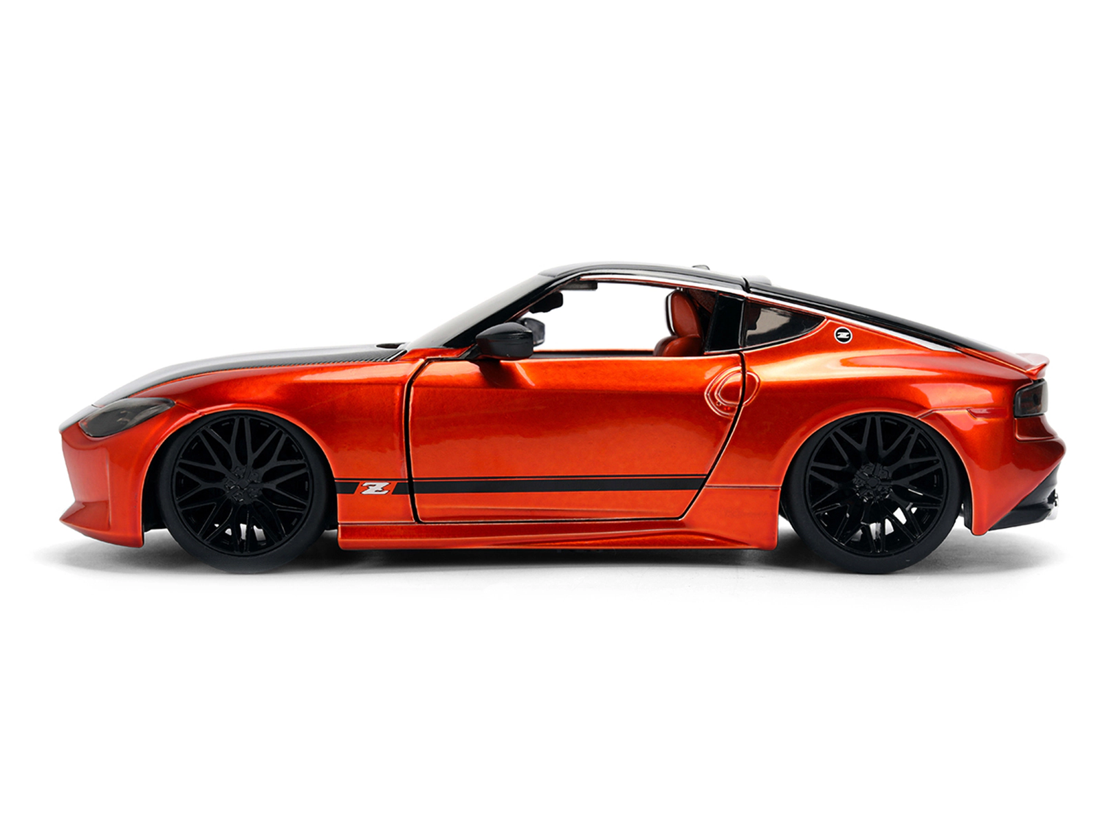 Jada 2023 Nissan Z Orange Metallic with Carbon Hood and Black Top "JDM Tuners" Series 1/24 Diecast Model Car by Jada