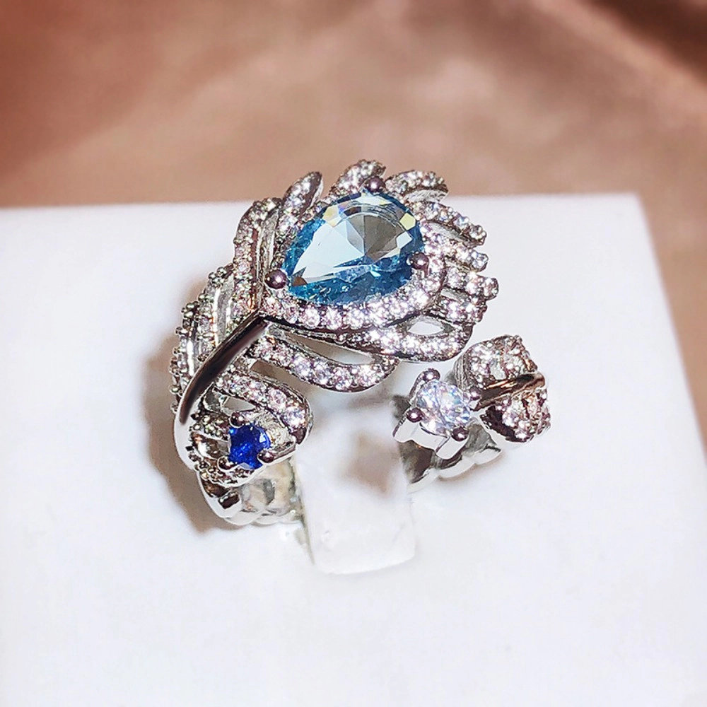 Pear‑Cut Sky‑Blue Cubic Zirconia Feather Open Ring Silver‑Tone Adjustable Statement Ring for Women