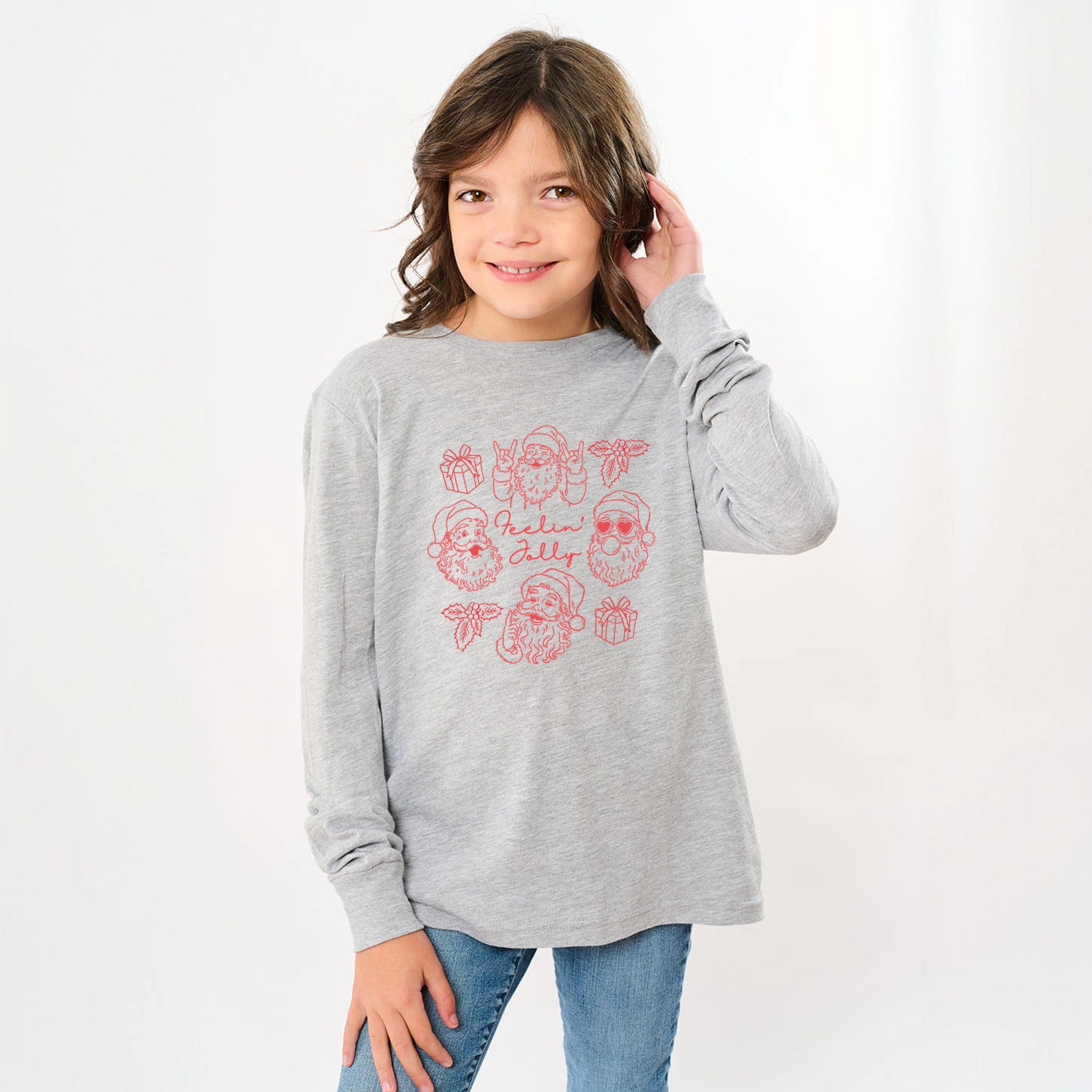 The Juniper Shop - Youth Long Sleeve Graphic T-Shirt Feelin' Jolly Santa Outline