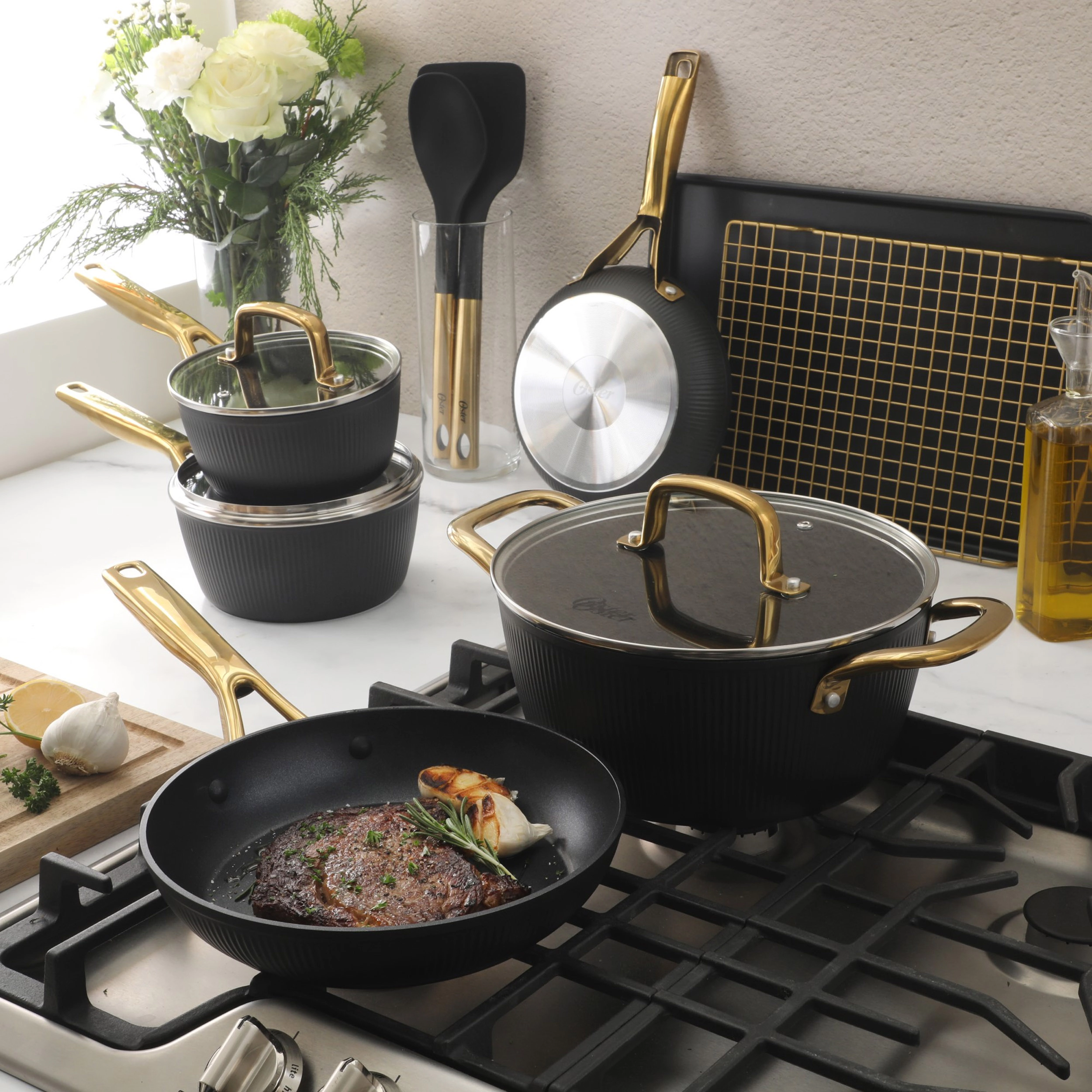 Oster Abbottsford 16 Piece Ceramic Nonstick Aluminum Cookware Set in Black with Gold Handles
