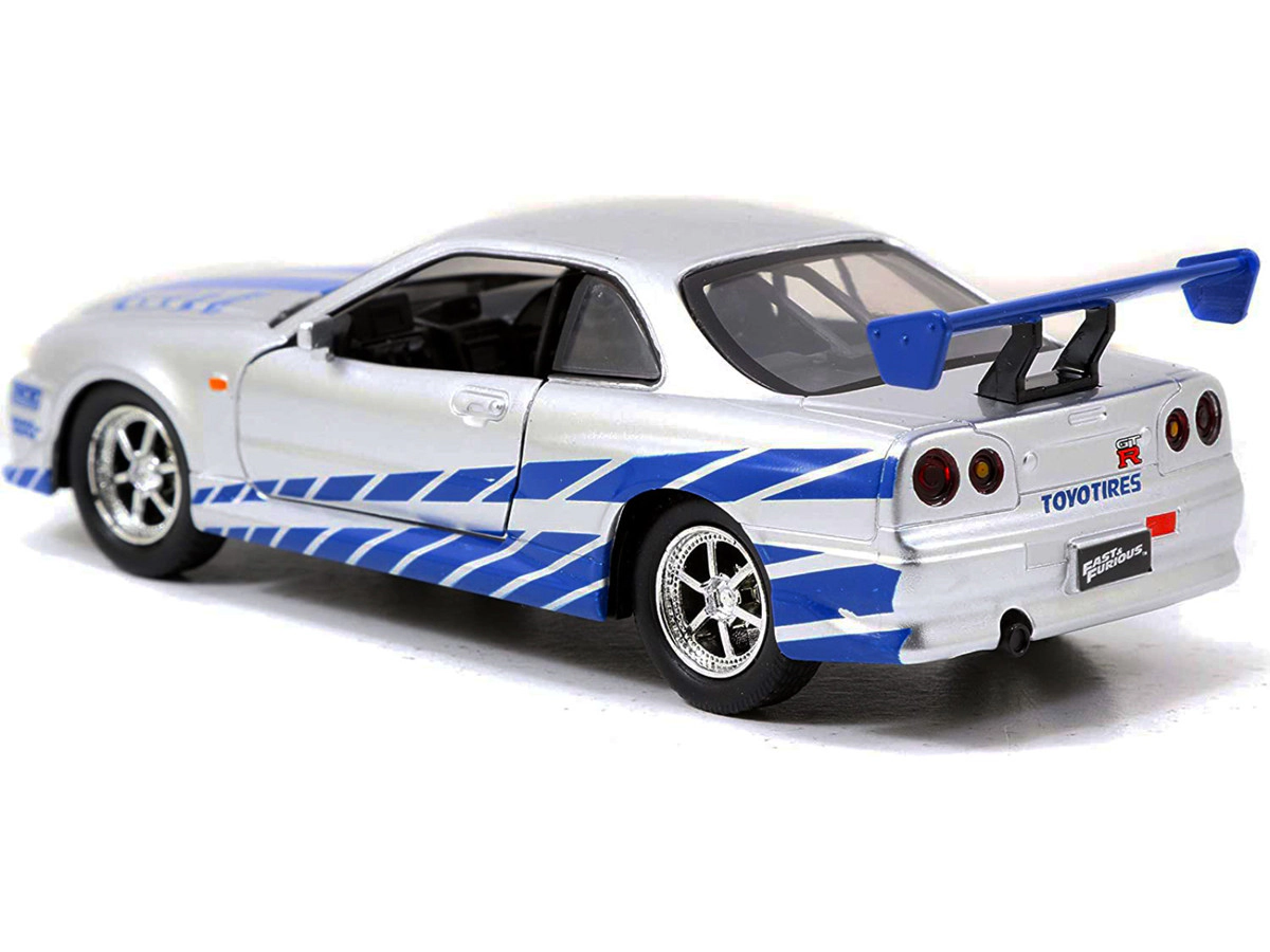 Jada Brian'S Nissan Skyline Gt-R (R34) Rhd (Right Hand Drive) Silver Metallic With Blue Stripes "2 Fast 2