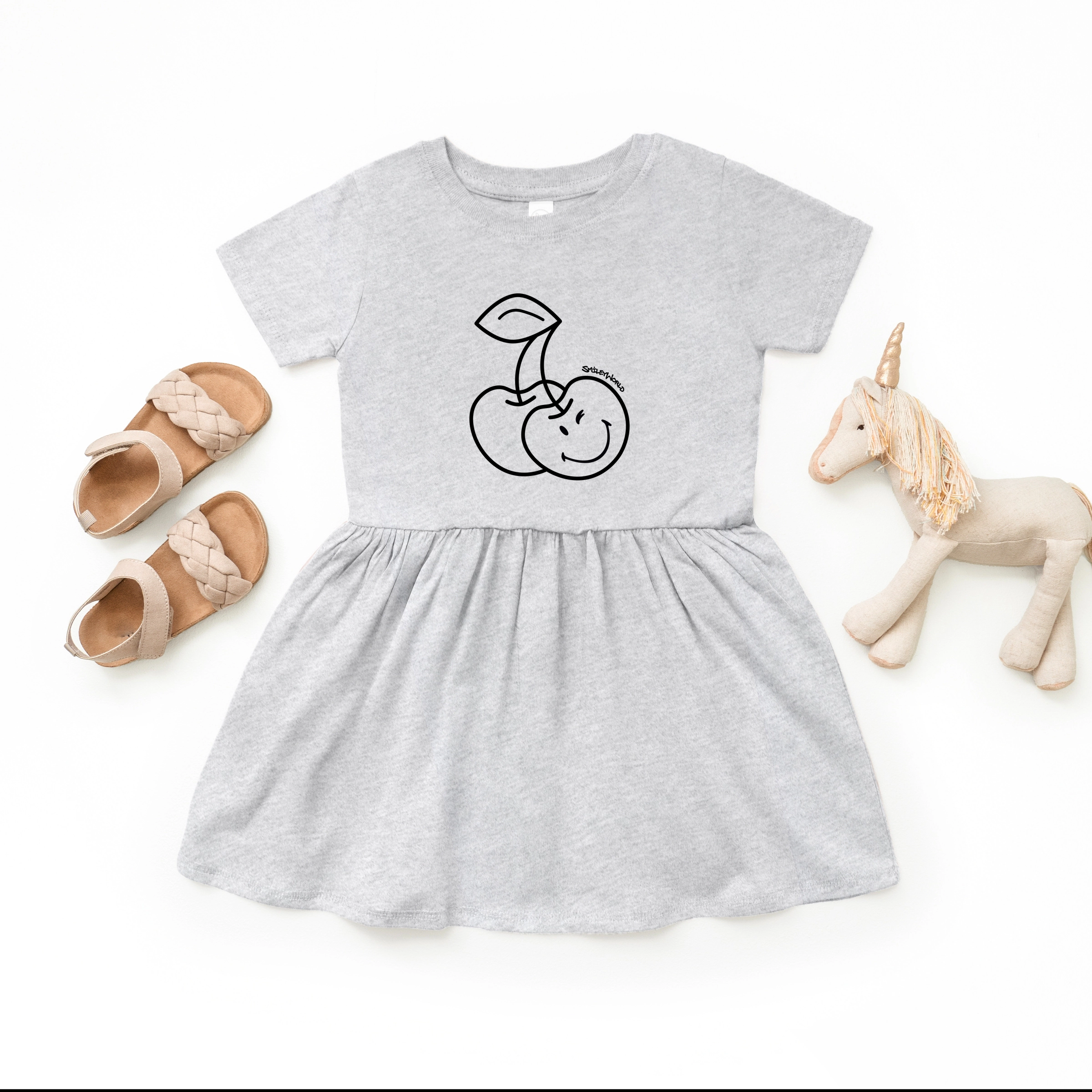 The Juniper Shop - Toddler Girl's Graphic Dress SmileyWorld Cherry Face Outline