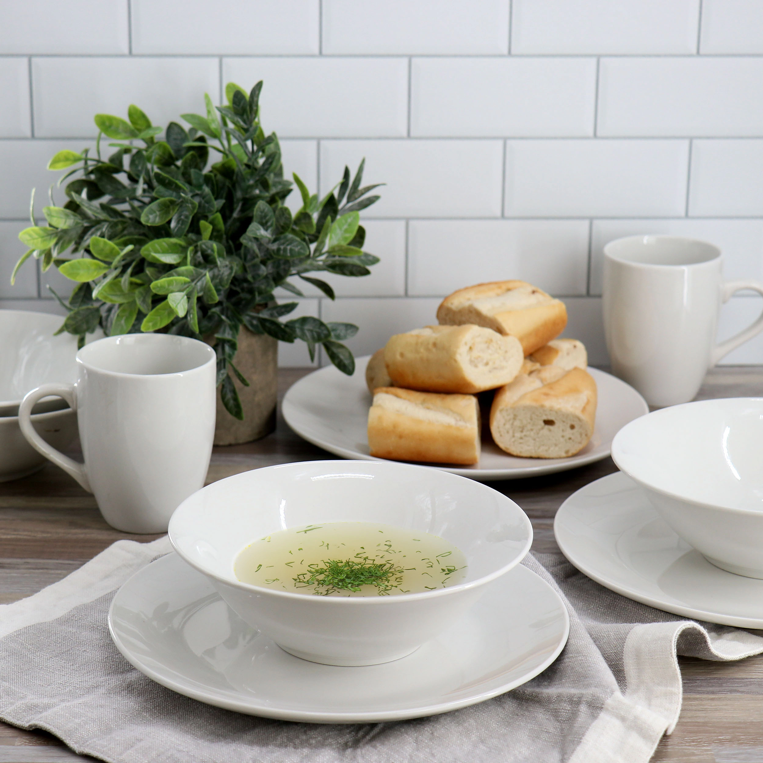 Gibson Home Wintercap 12 Piece Fine Ceramic Dinnerware Set in White