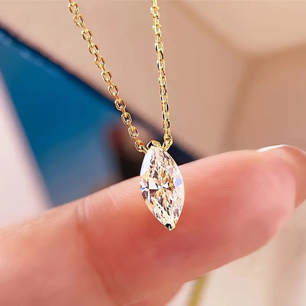 Wardrobe Whimsy Marquise Cut Cubic Zirconia Solitaire Pendant Gold Tone Necklace
