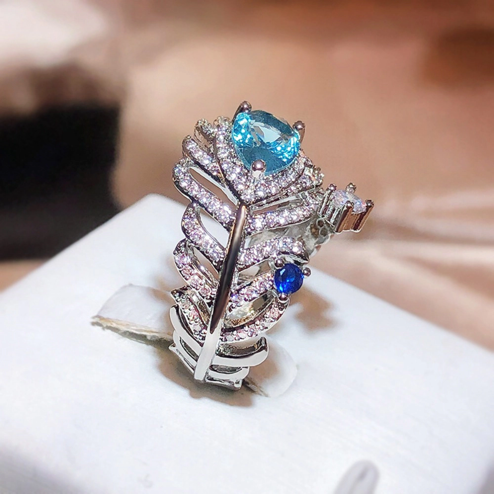 Pear‑Cut Sky‑Blue Cubic Zirconia Feather Open Ring Silver‑Tone Adjustable Statement Ring for Women