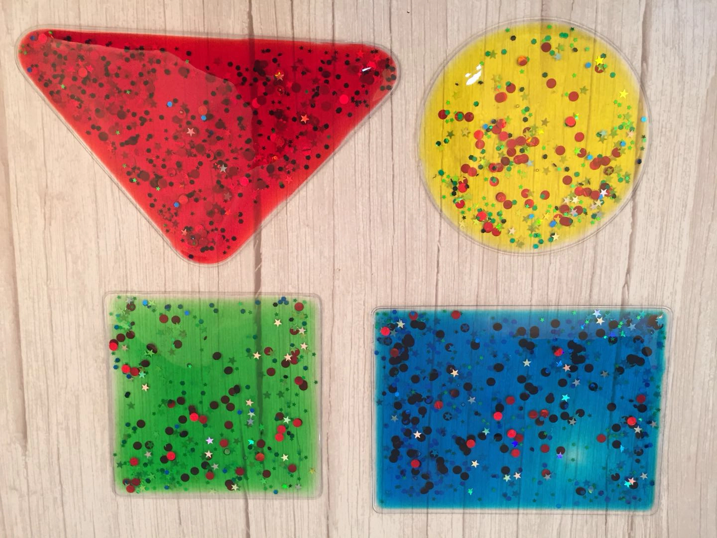 Playlearn Unisex 4 Pack Glitter Gel Shapes Fidget Toy