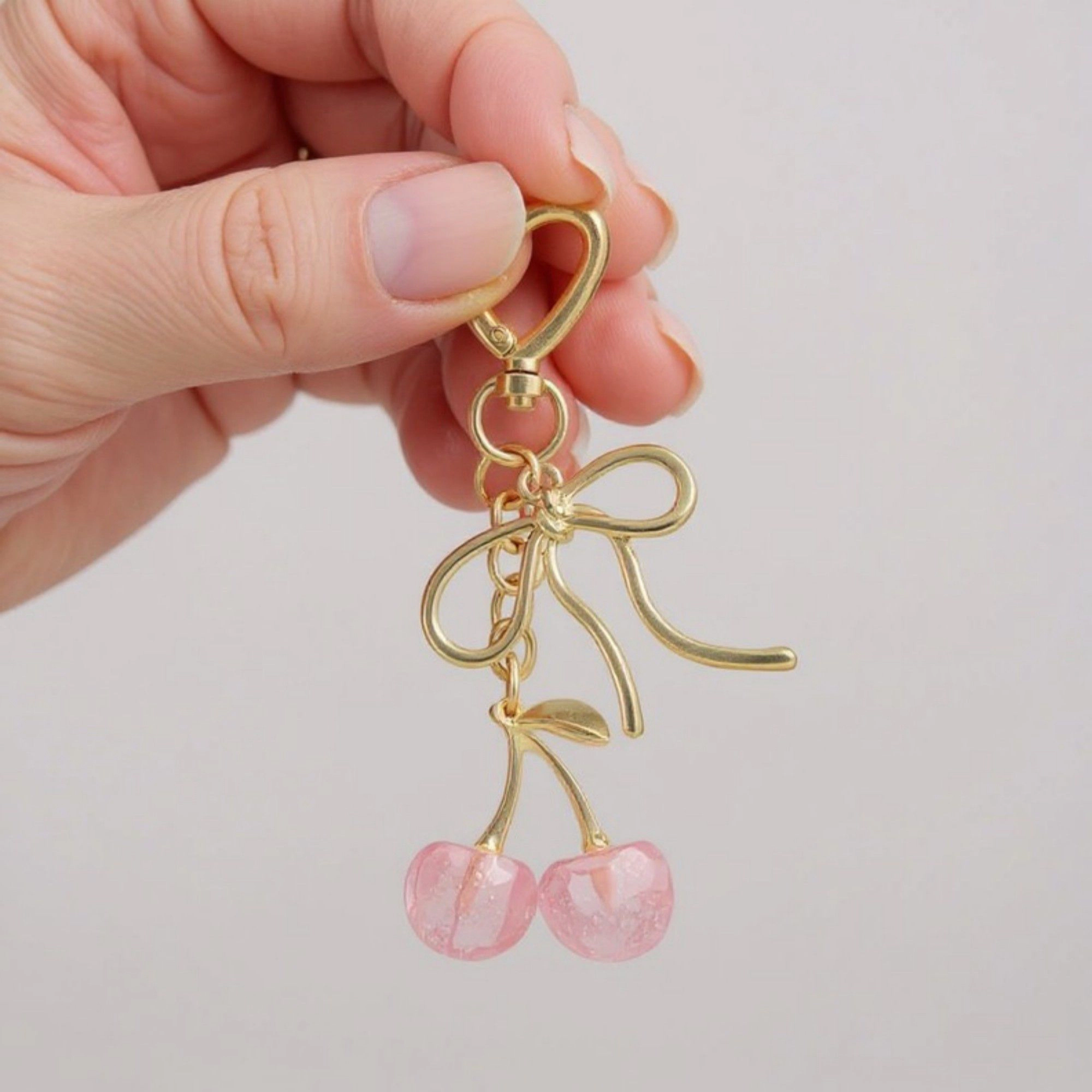 Alilang Women's Gold Bow Keychain with Pink Cherry Charms and Heart Clasp