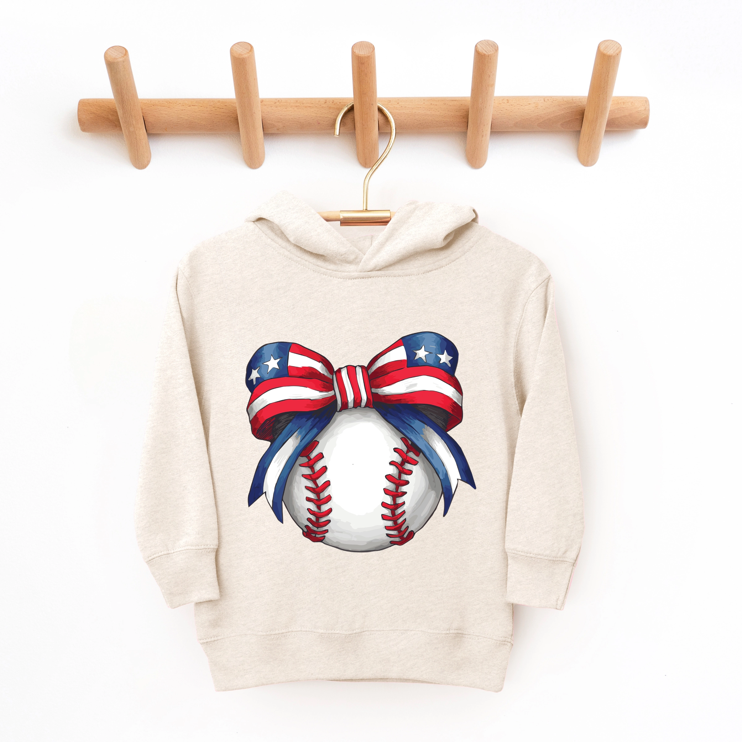 The Juniper Shop - Coquette Patriotic Baseball Toddler Hoodie