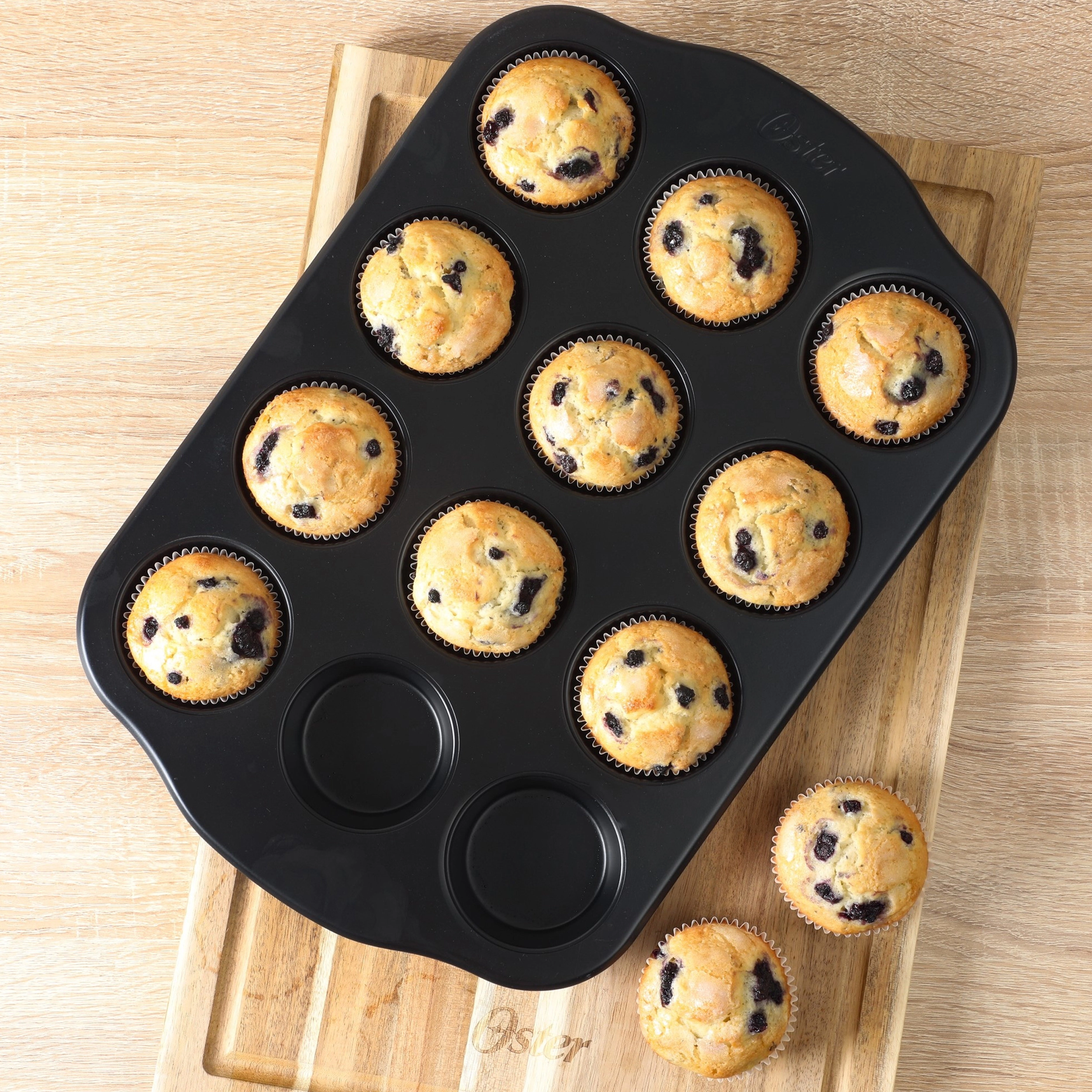 Oster Teston Platinum Collection 12-Cup Nonstick Carbon Steel Muffin Pan in Matte Black