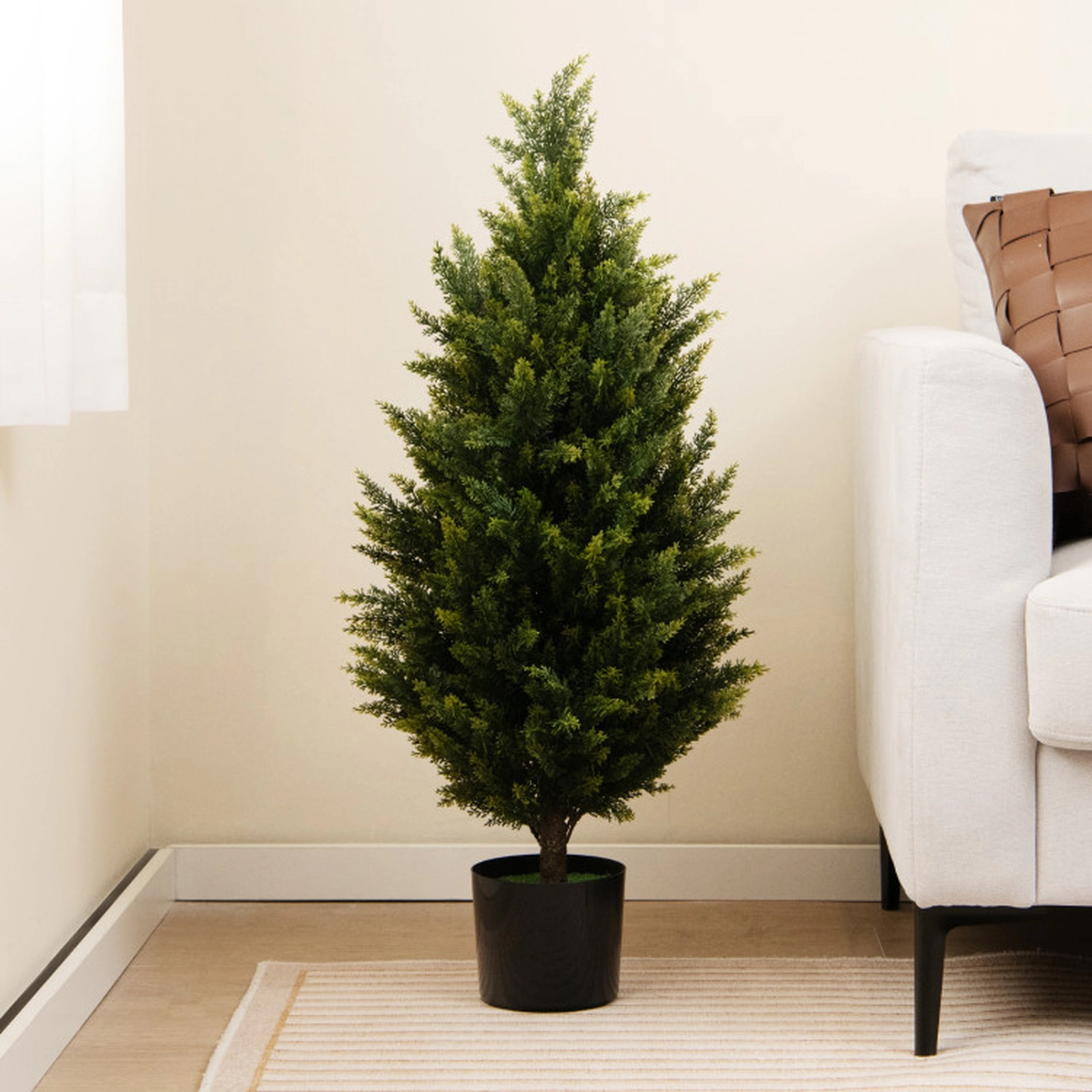 SUGIFT Dense Foliage Artificial Cedar Topiary Tree with Cement Plastic Pot 37-in Tall Green and Black with Faux Moss