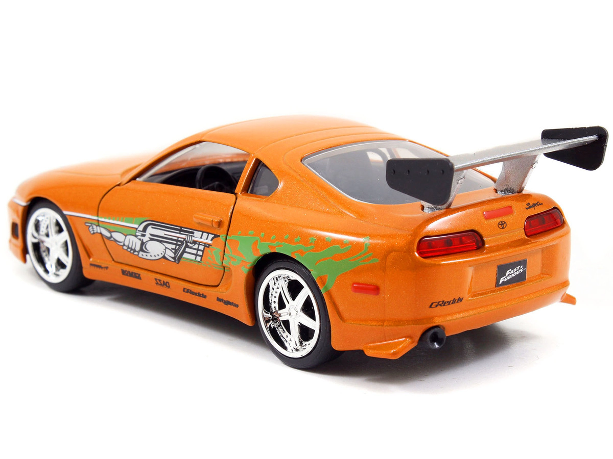 Jada Brian's Toyota Supra Orange with Graphics "The Fast and the Furious" (2001) Movie "Fast & Furious 25th