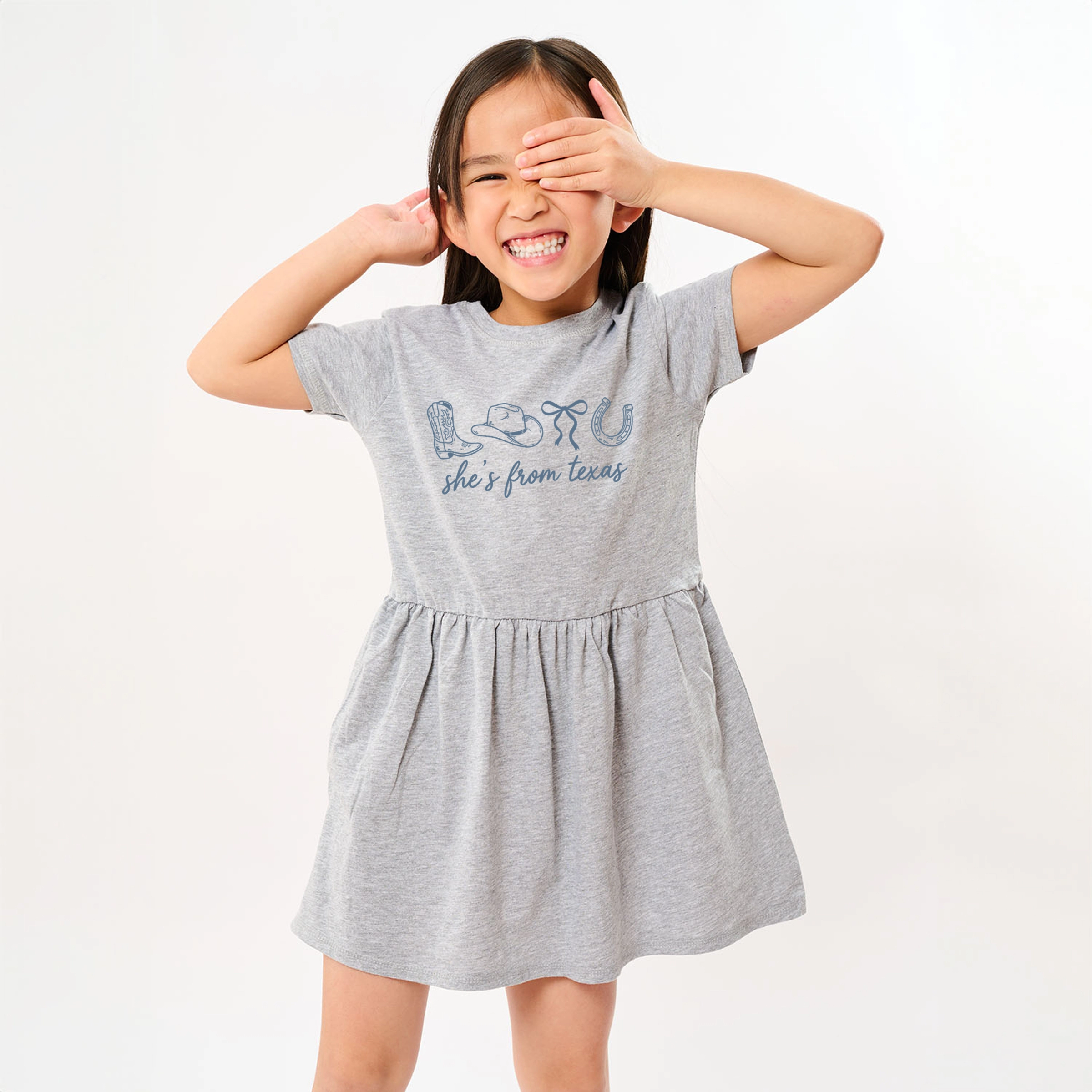 The Juniper Shop - Toddler Girl's Graphic Dress She's From Texas Icons