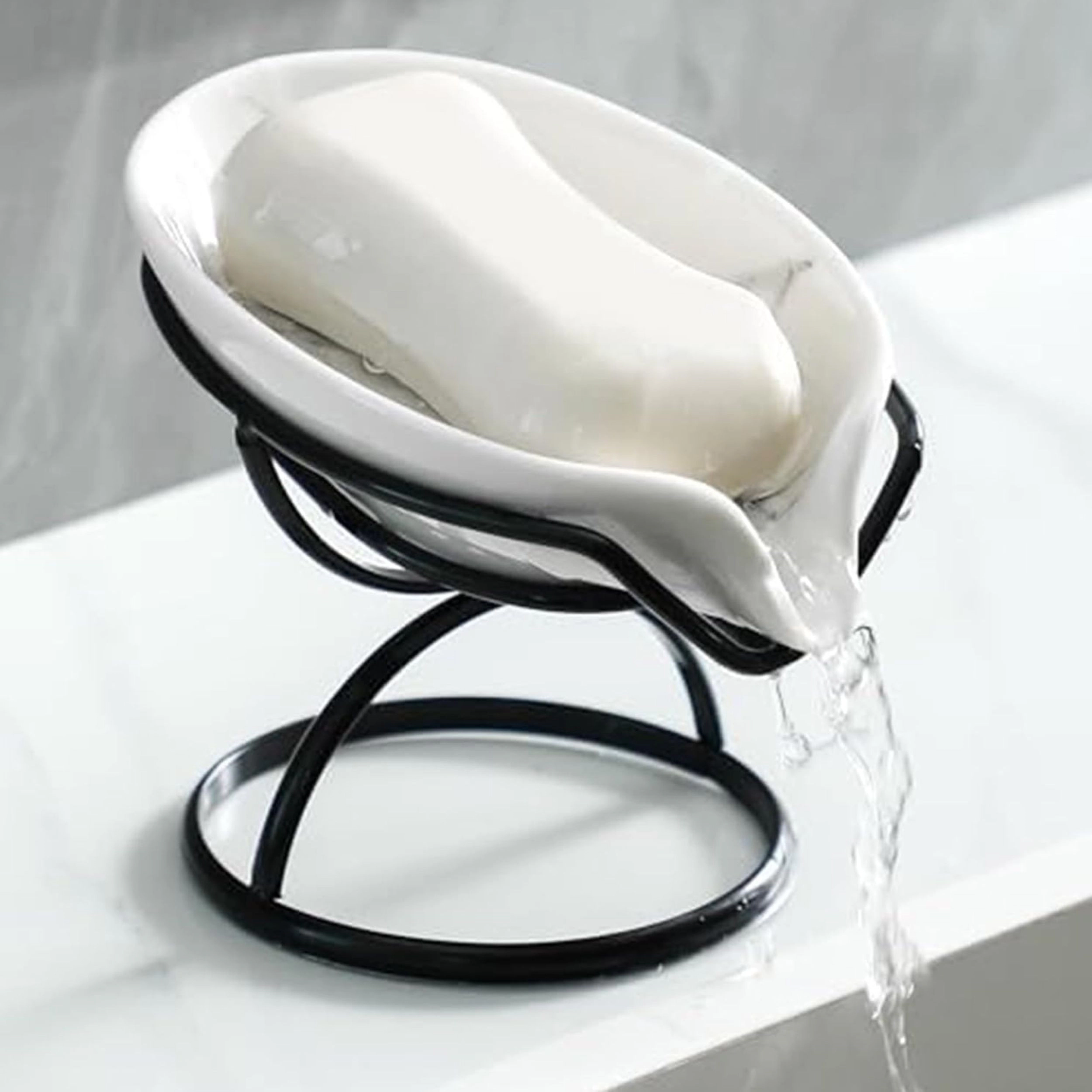Stock Preferred Leaf Shaped Ceramic Self Draining Soap Dish with Stainless Steel Stand