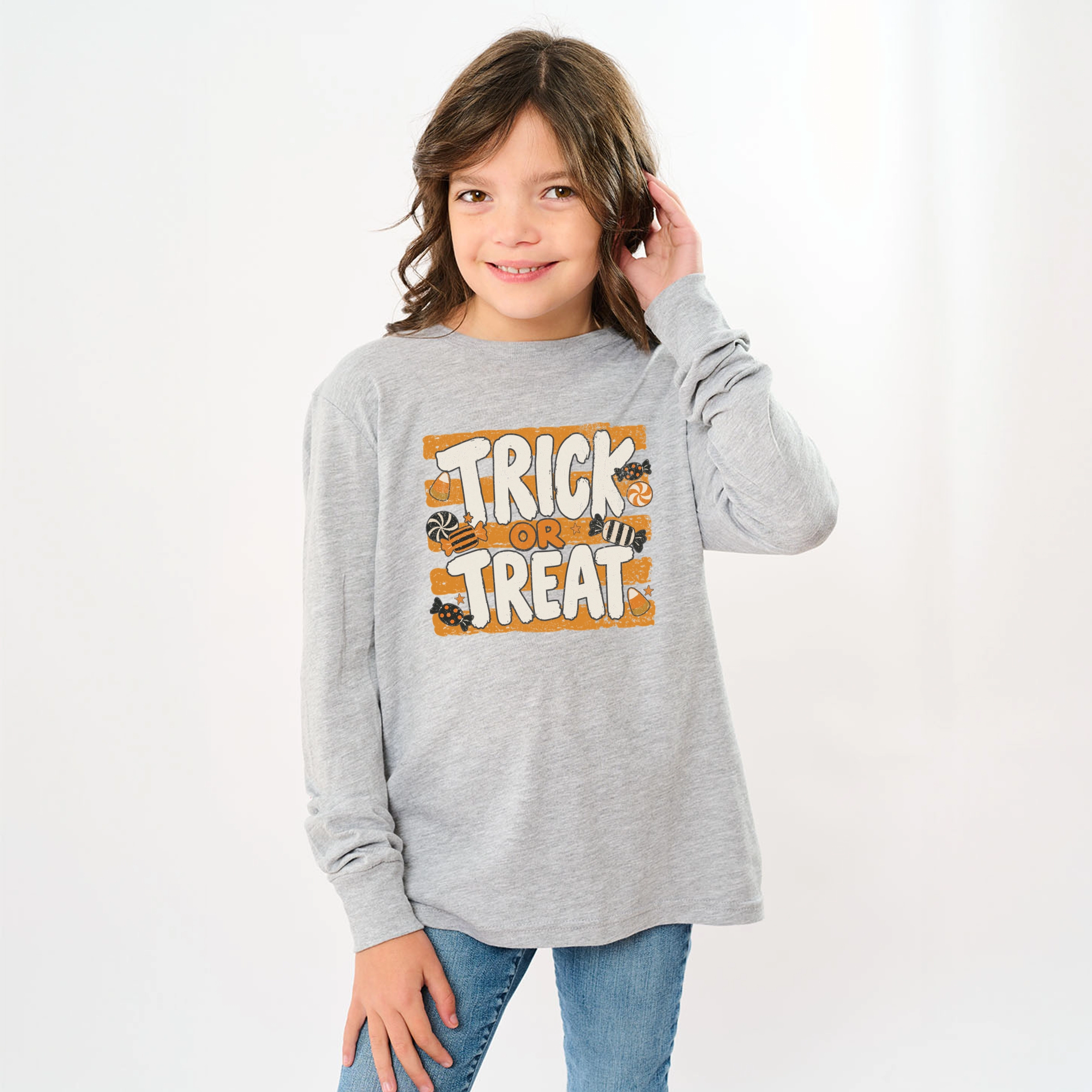 The Juniper Shop - Youth Long Sleeve Graphic T-Shirt Trick or Treat Orange Stripes