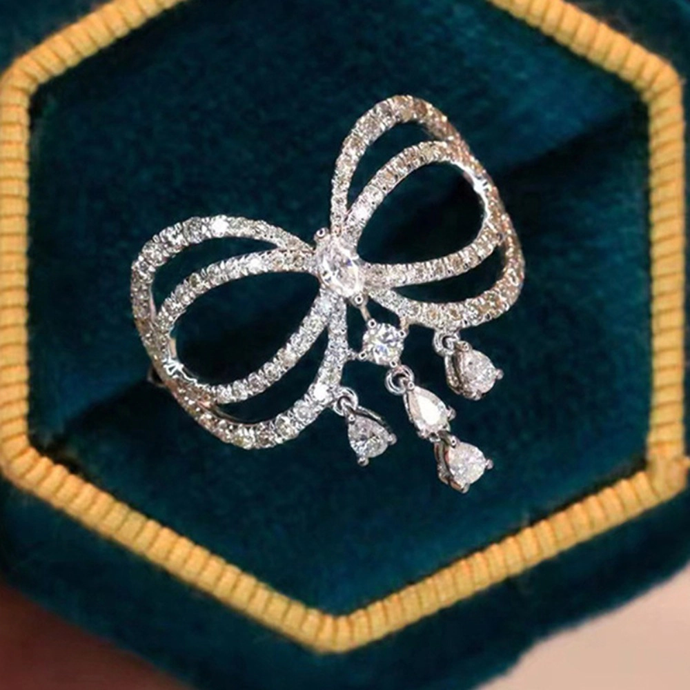 Wardrobe Whimsy Bow Shape Dangling Cubic Zirconia Statement Ring for Women