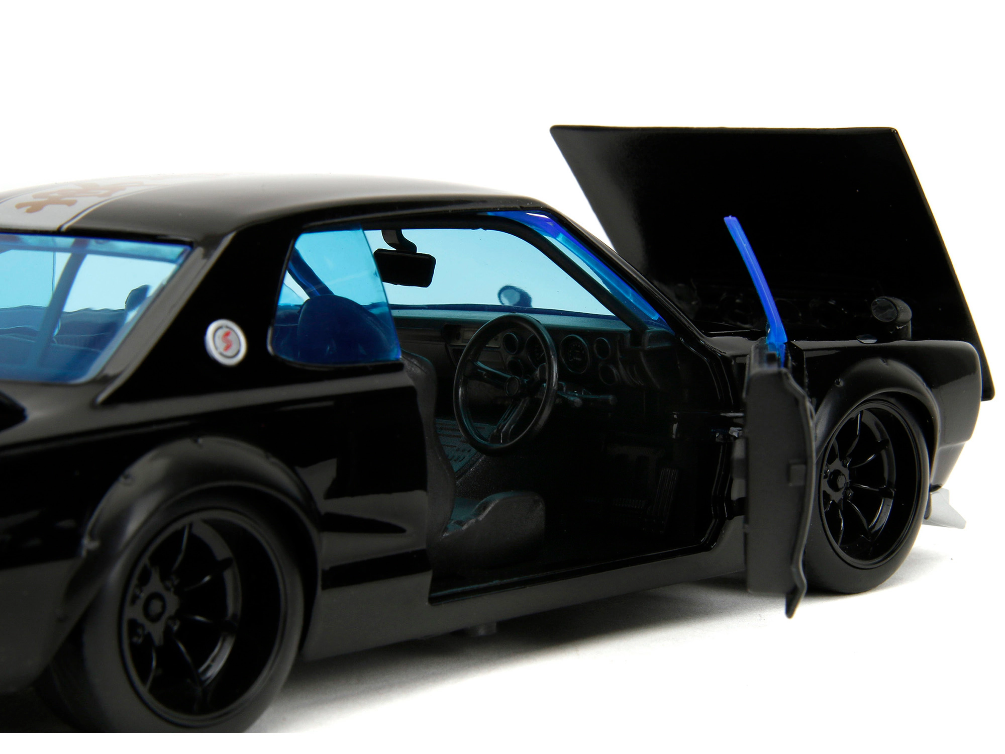 Jada 1971 Nissan Skyline GT-R RHD (Right Hand Drive) Black with Silver Stripe and Mikey Diecast Figure "Tokyo