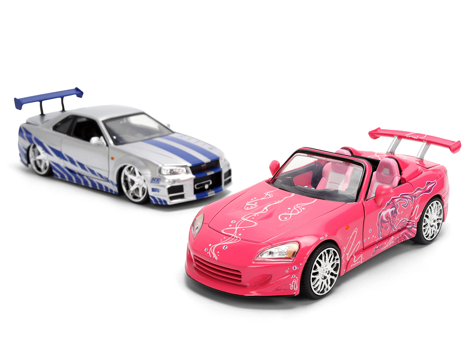 Jada Brian's Nissan Skyline GT-R (R34) Silver Metallic with Blue Stripes and Suki's Honda S2000 Pink with
