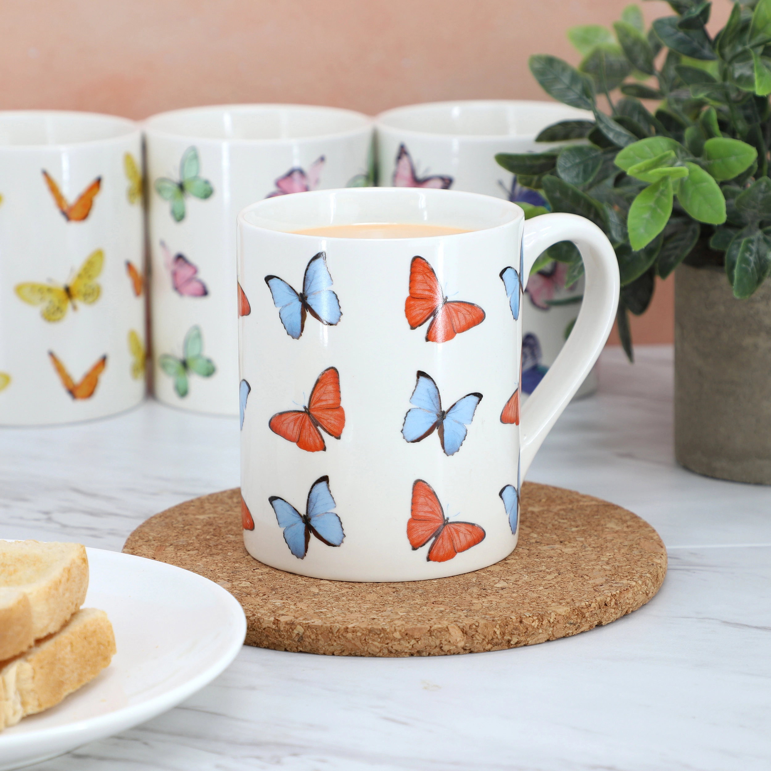 Gibson Home Butterfly Wings 4 Piece 18 Ounce Stoneware Mug Set in White