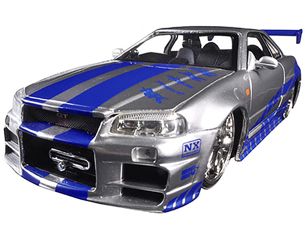 Jada Brian's Nissan GTR Skyline R34 RHD (Right Hand Drive) Silver with Blue Stripes "Fast & Furious 25th