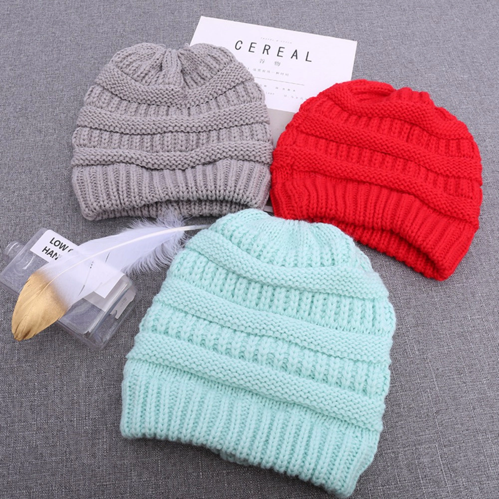 Wardrobe Whimsy Soft Stretch Cable Knit Messy Bun Ponytail Beanie Winter Hat for Women