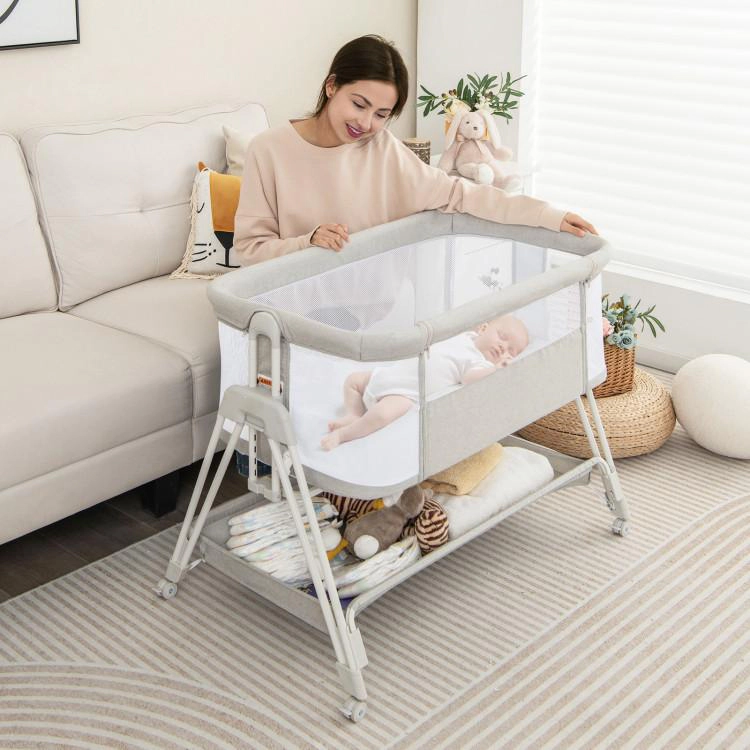 SUGIFT Portable Bedside Sleeper Bassinet with 7 Adjustable Heights 20-lb Capacity Ages 0-6 Months Gray/Black