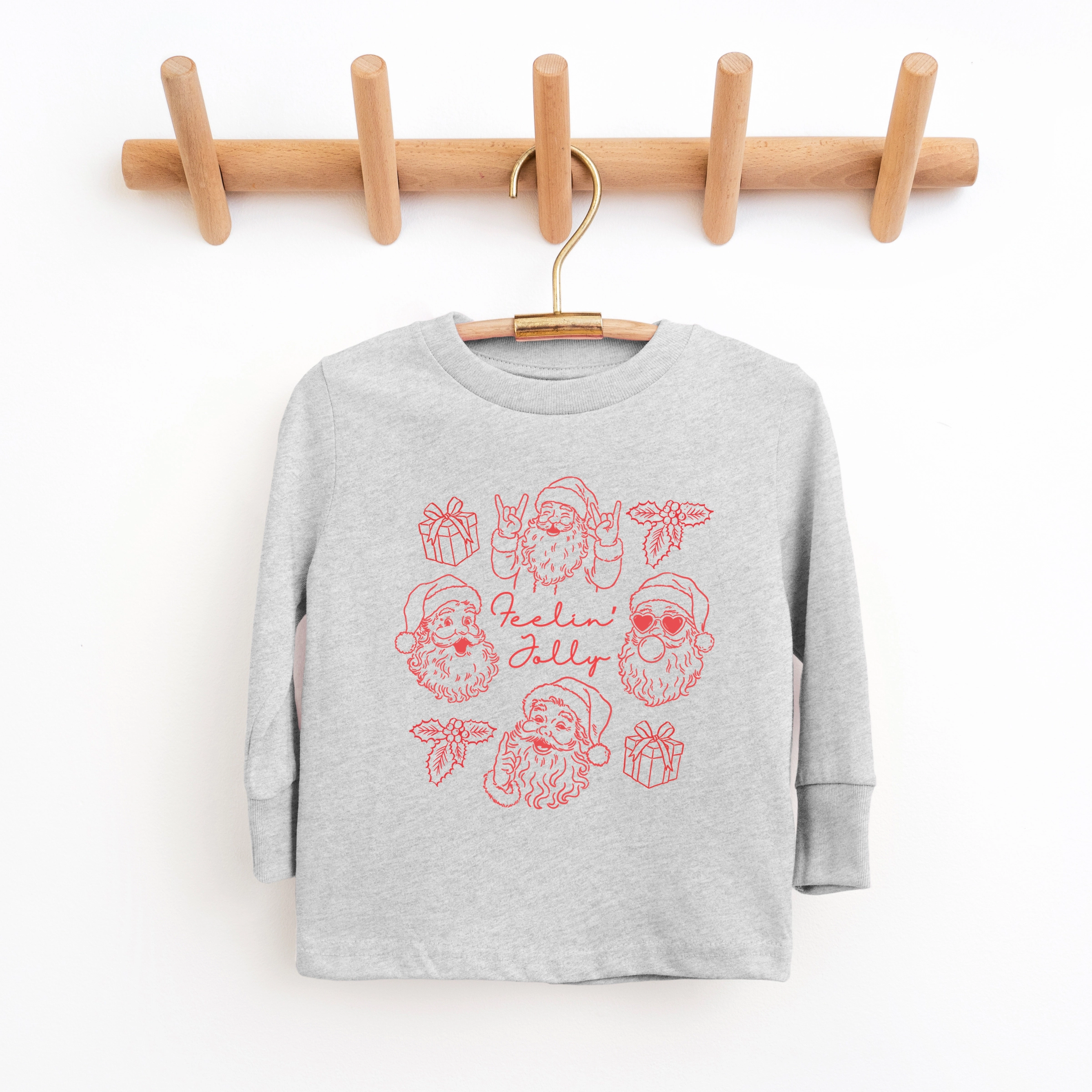 The Juniper Shop - Youth Long Sleeve Graphic T-Shirt Feelin' Jolly Santa Outline