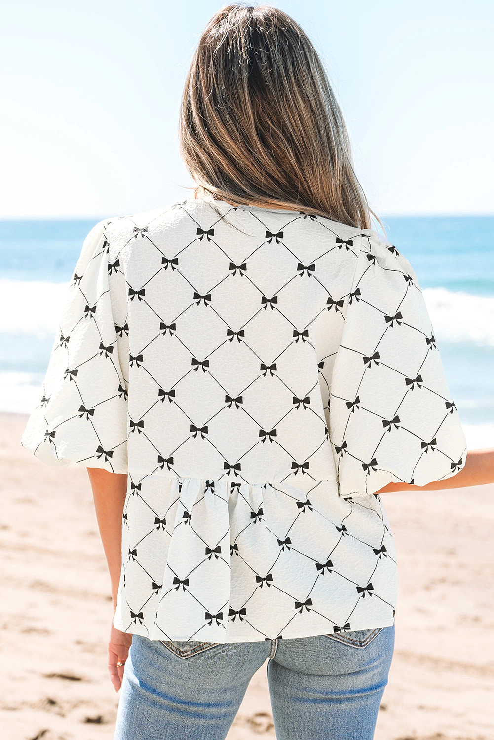 Threaded Pear Women's Ezra Bowknot Print Front Knots Bubble Sleeve Blouse