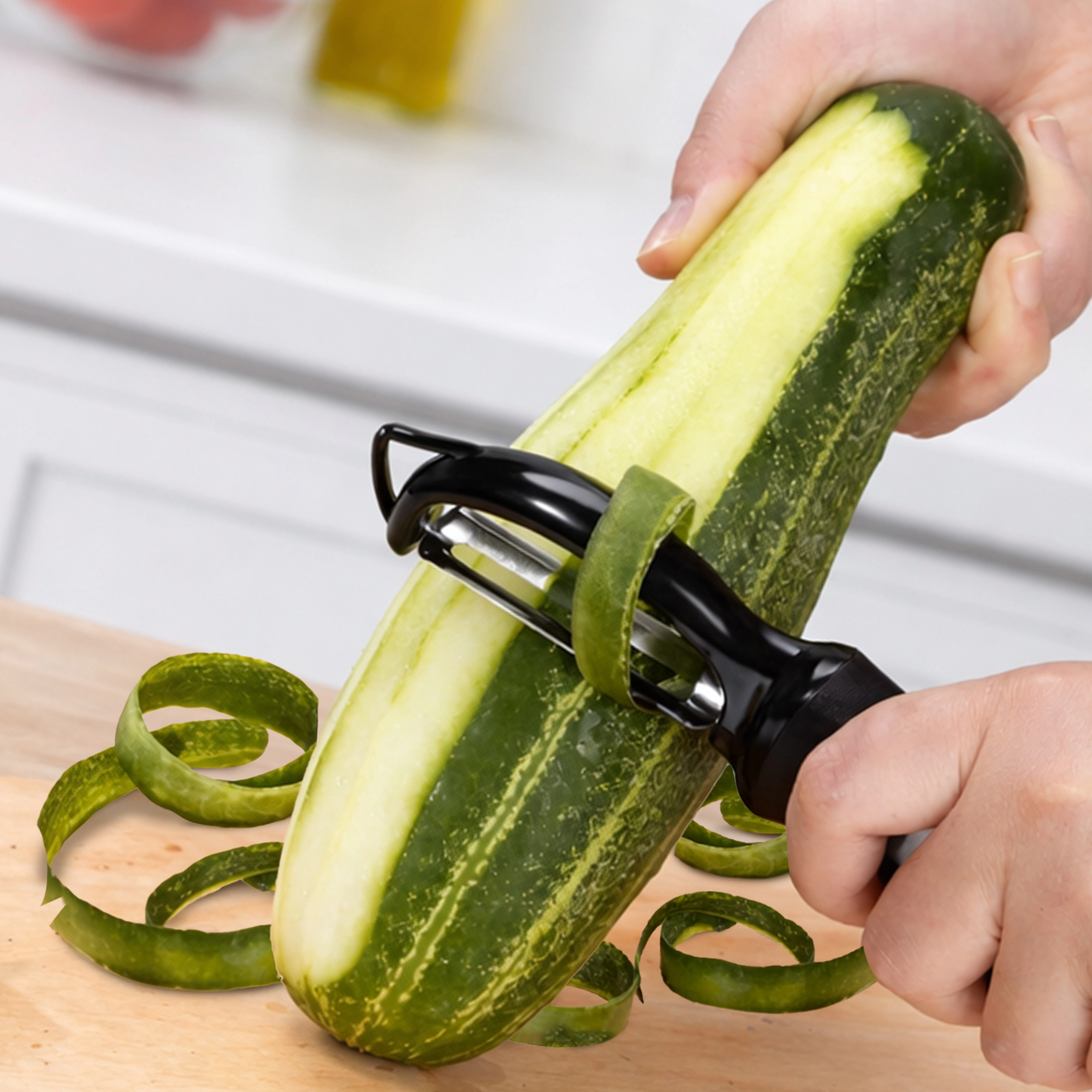 Cheer Collection Swivel Vegetable Peeler with Stainless Steel Twin Blades Black
