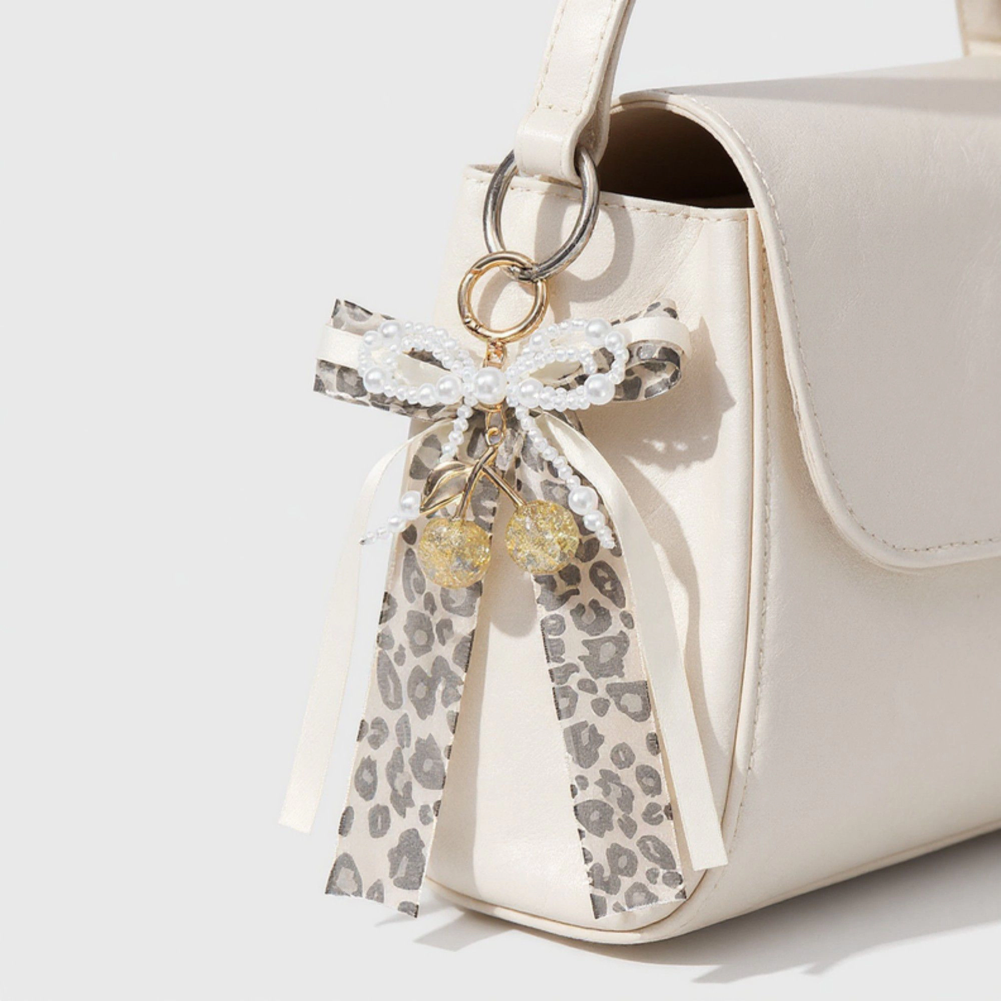 Alilang Women's Fashion Leopard Print Ribbon Keychain with Pearl Bow and Cherry Charms