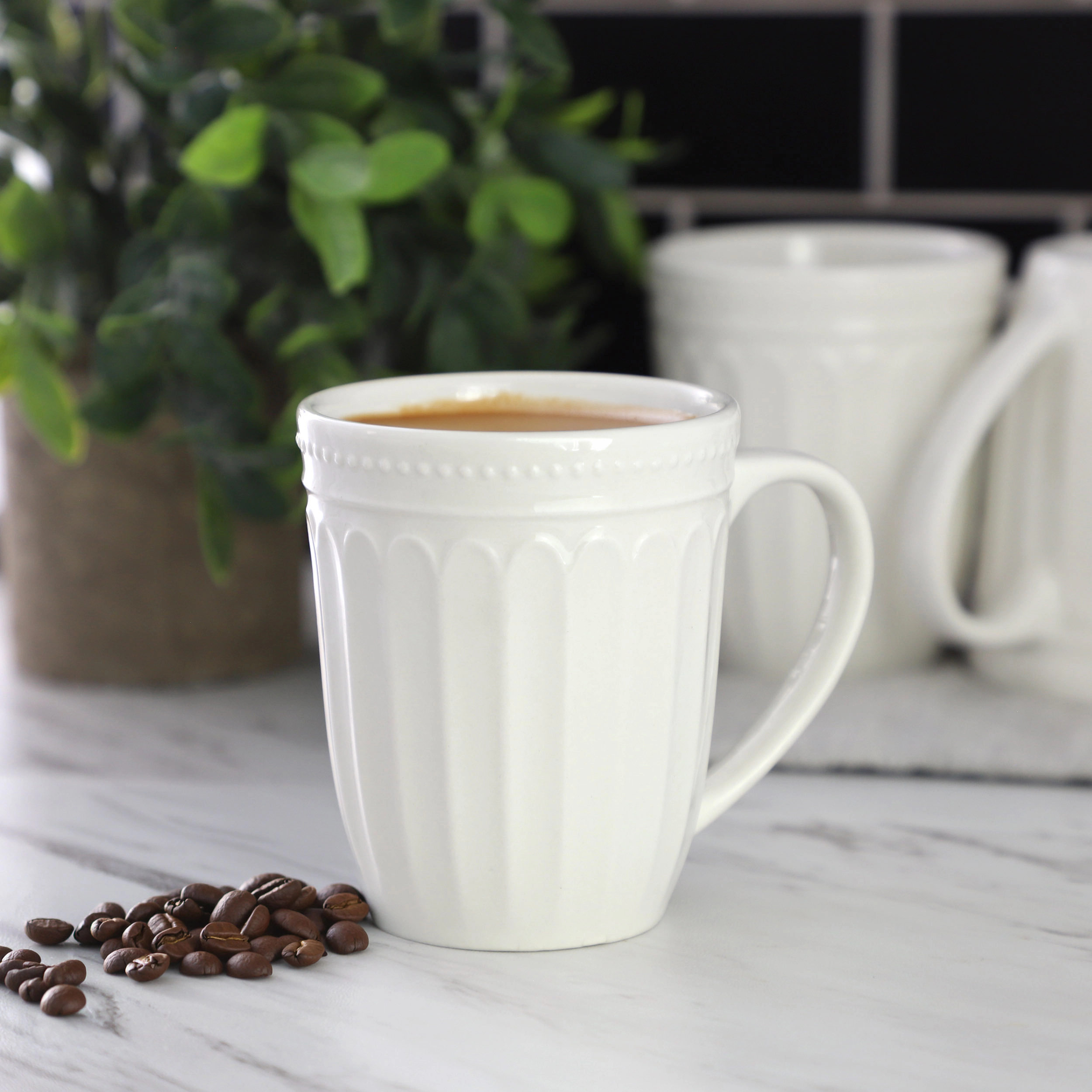 Elama Hansel 6 Piece Embossed Arch Stoneware 12 Ounce Mug Set in White
