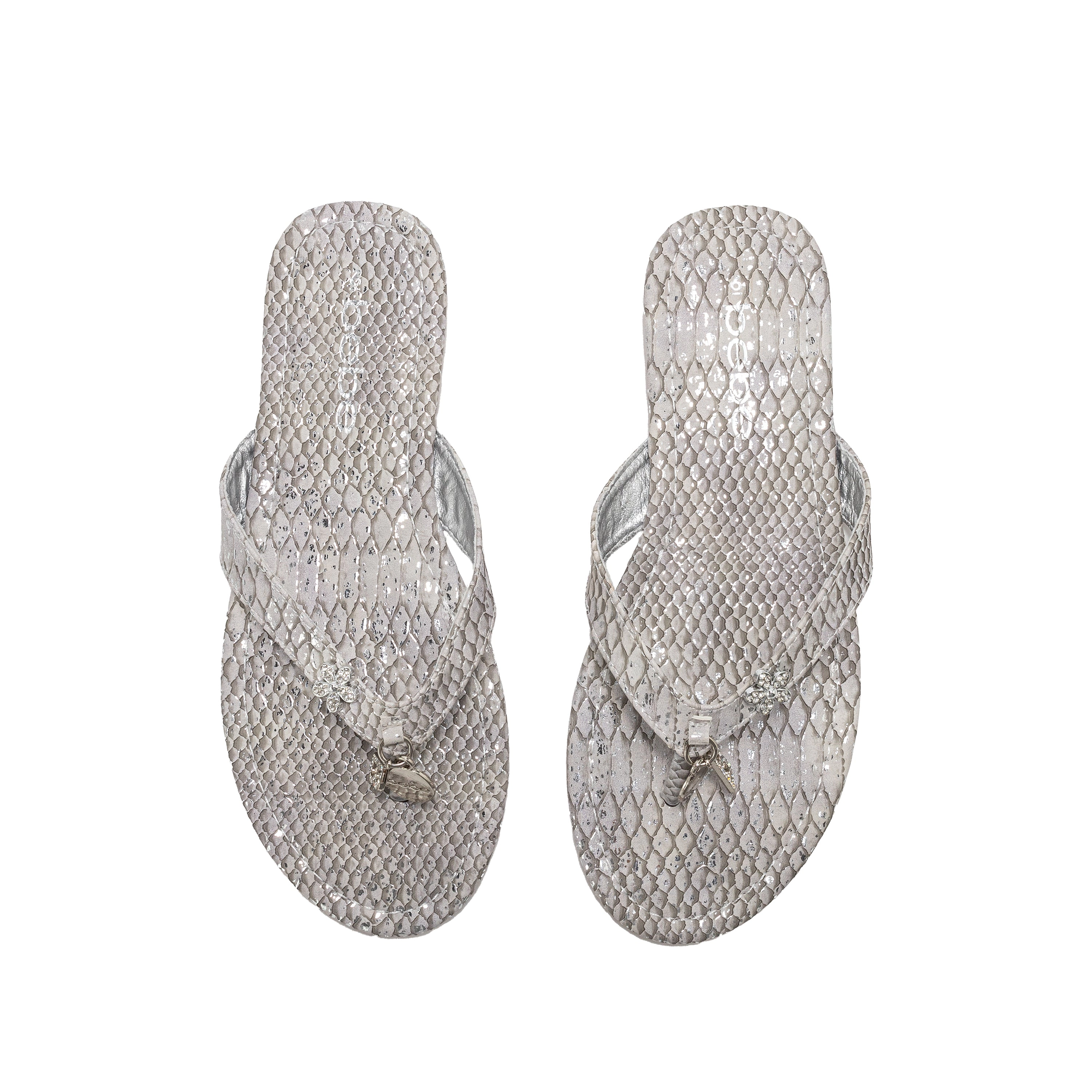 bebe Women’s Metallic Thong Sandals with Charm Detail - Flat Slip-On Summer