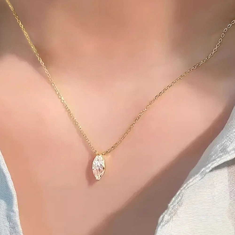 Wardrobe Whimsy Marquise Cut Cubic Zirconia Solitaire Pendant Gold Tone Necklace